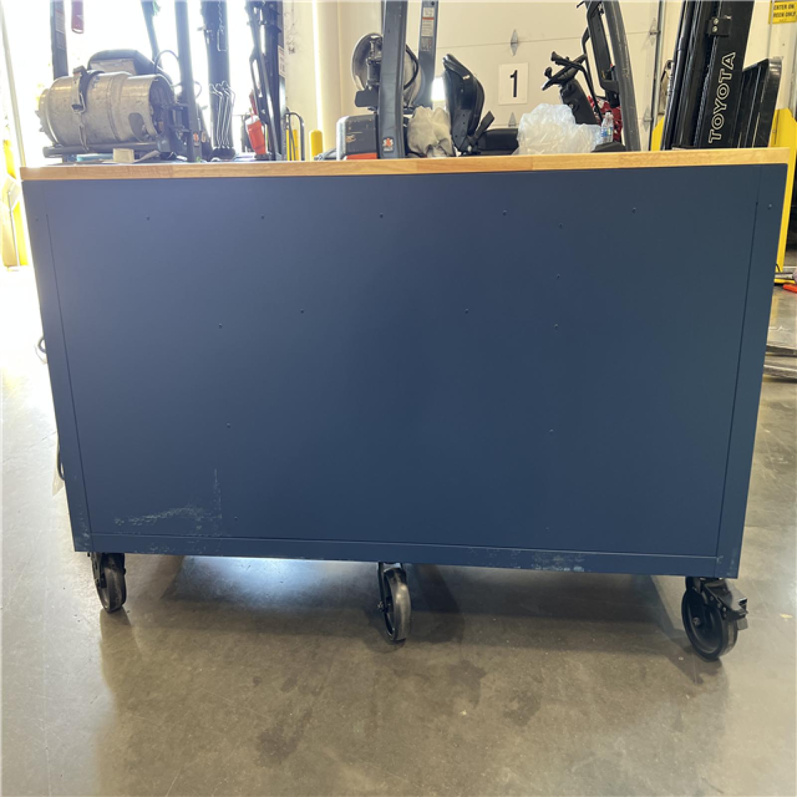 DALLAS LOCATION- Husky 72 in. W x 24 in. D Heavy Duty 18-Drawer Adjustable Height Mobile Workbench with Solid Wood Top in Matte Blue