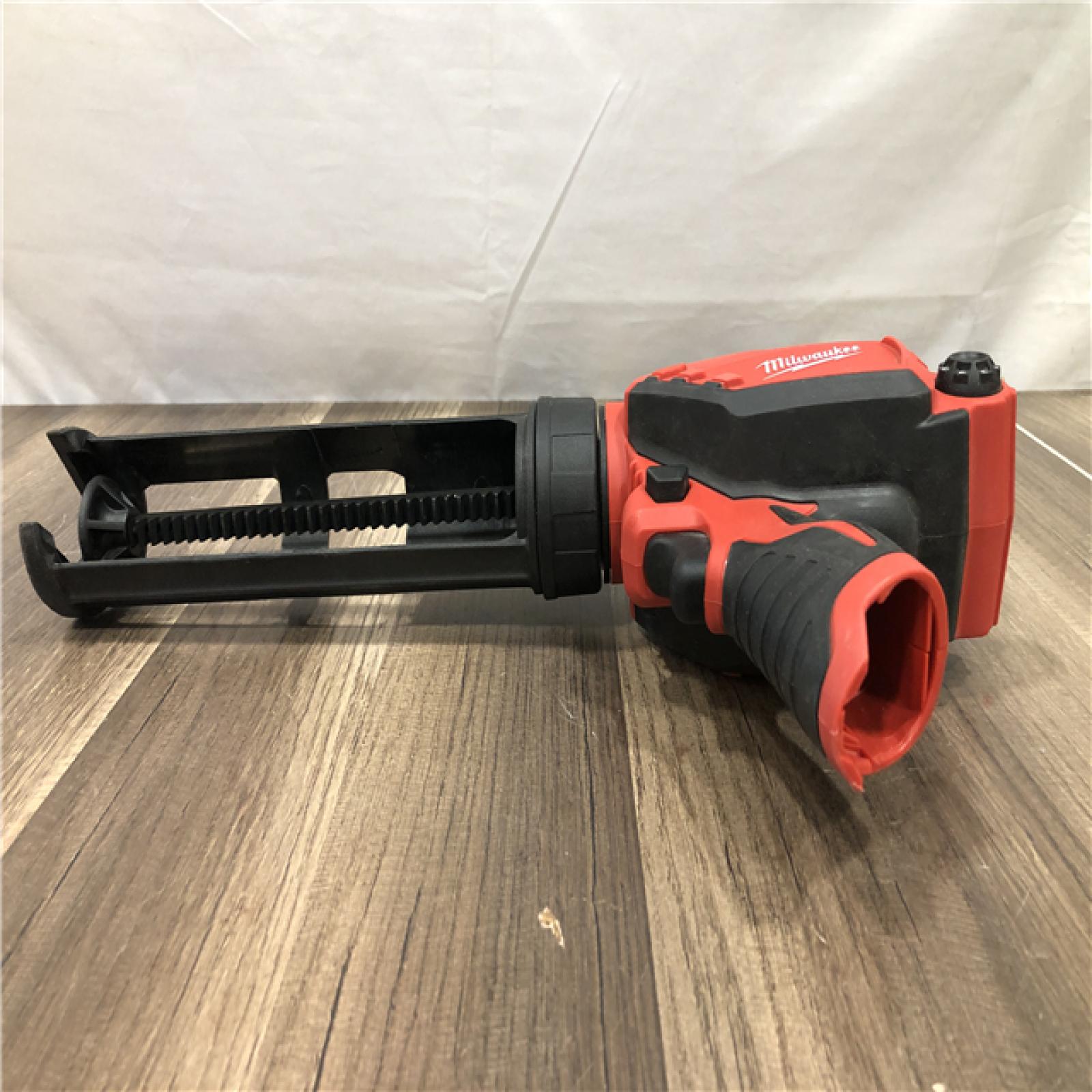 AS-IS Milwaukee  12V Lithium-Ion Cordless 10 oz. Adhesive and Caulk Gun (Tool-Only)