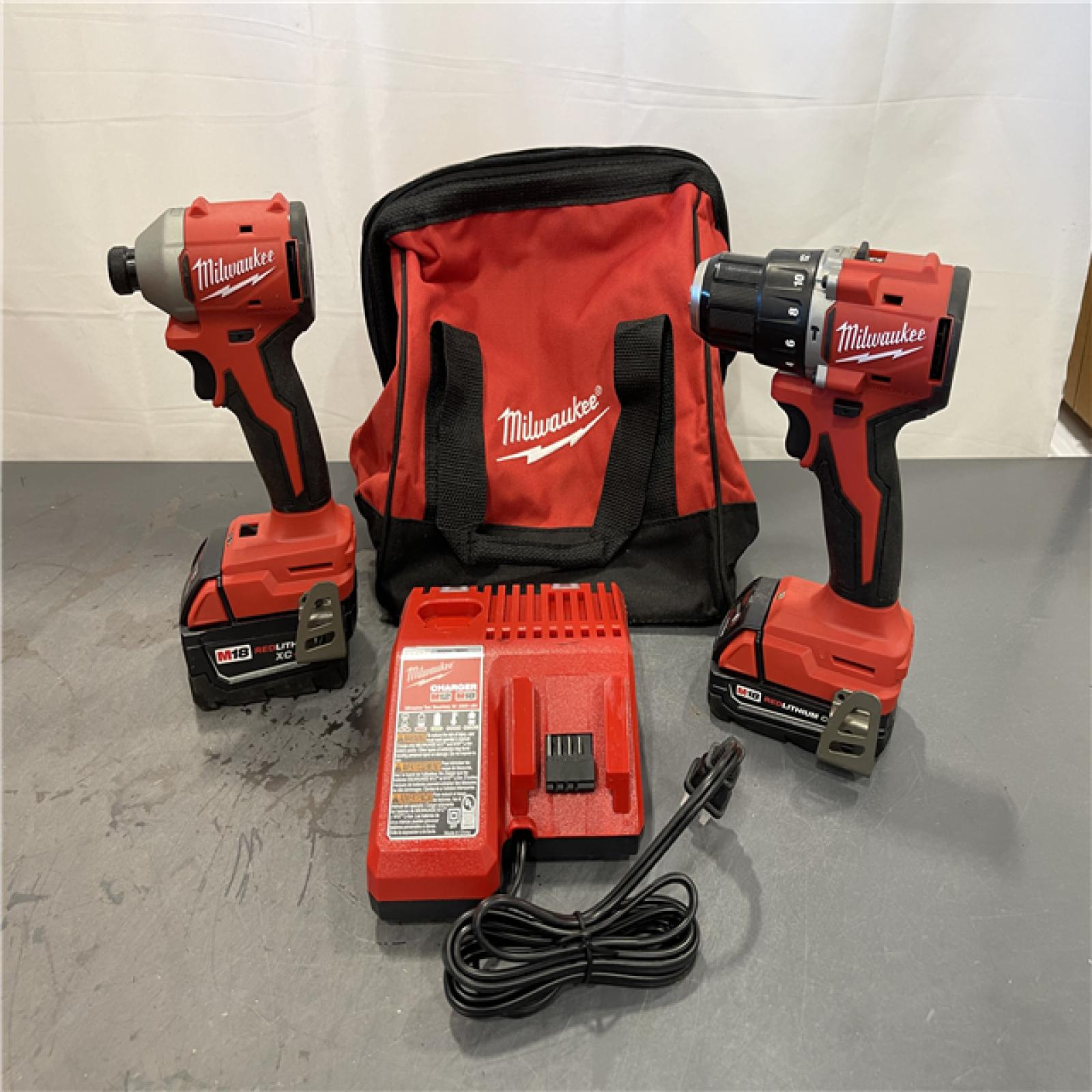 AS-IS - Milwaukee M18 18-Volt Lithium-Ion Brushless Cordless Compact Hammer Drill/Impact Combo Kit