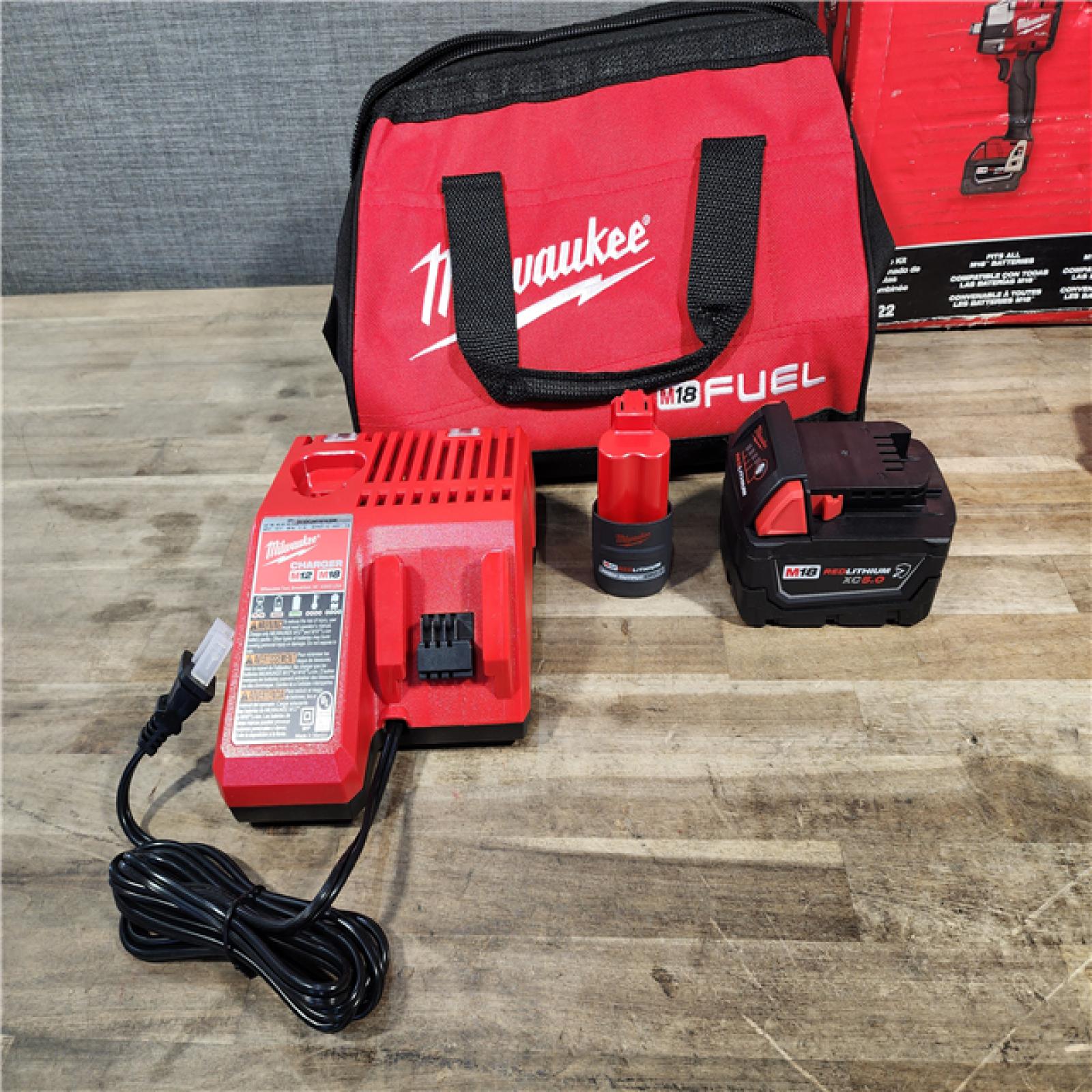 HOUSTON LOCATION - AS-IS (APPEARS LIKE NEW) M18 FUEL 18V Cordless Mid Torque 1/2 in. Impact Wrench W/ M12 FUEL 3/8 in. Ratchet & Battery/Charger Combo Kit