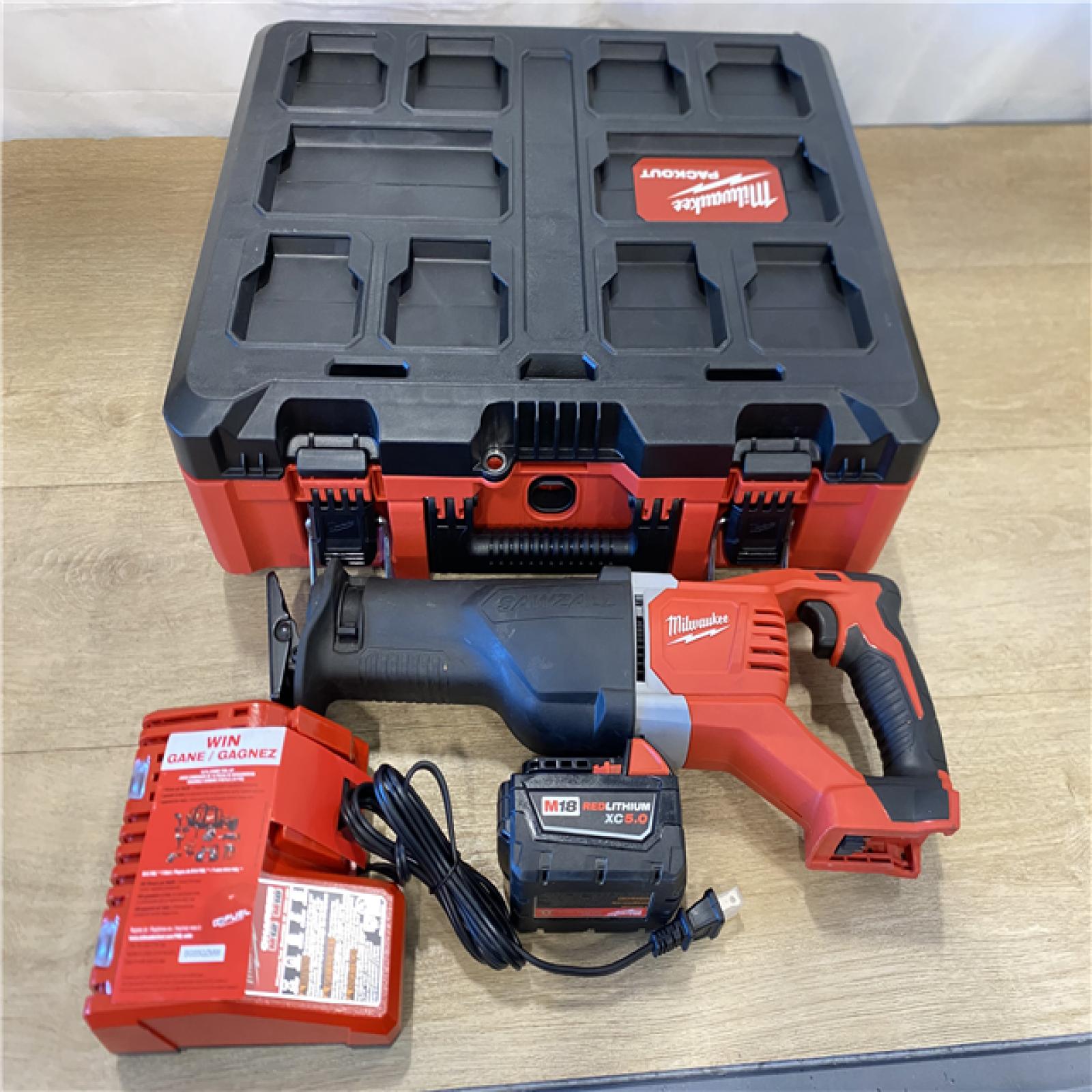 AS-IS MILWAUKEE M18 FUEL18V Lithium-Ion Brushless Cordless SAWZALL Reciprocating Saw with PACKOUT Tool-Box  (1) 5.0 Battery  and Charger