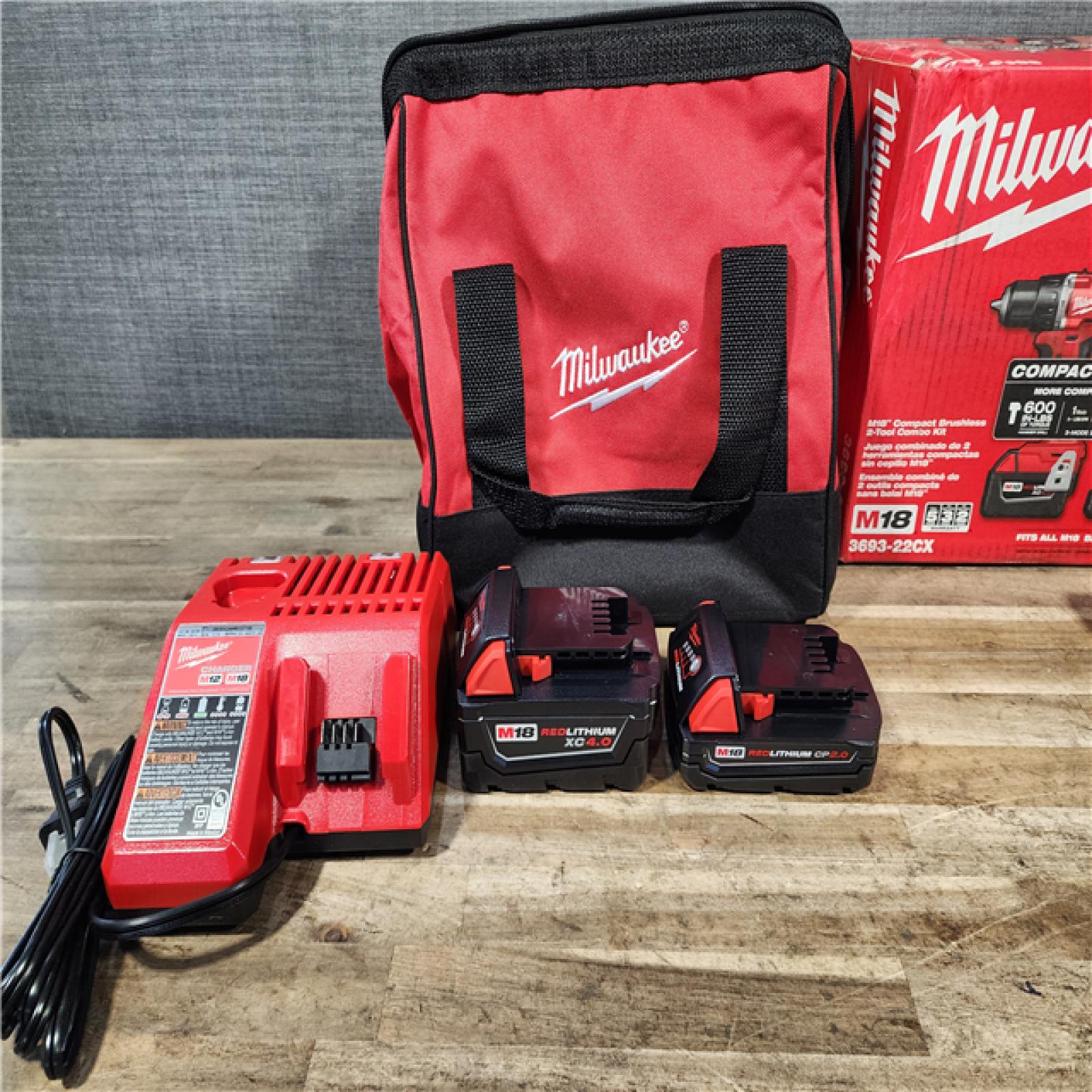 HOUSTON LOCATION - AS-IS M18 18-Volt Lithium-Ion Brushless Cordless Compact Hammer Drill/Impact Combo Kit (2-Tool) with (2) Batteries  Bag