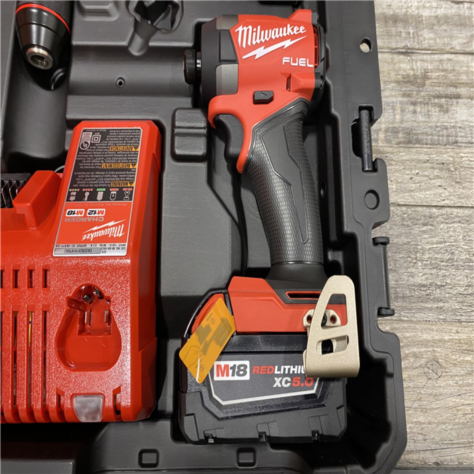 AS-IS Milwaukee FUEL 18V Lithium-Ion Brushless Cordless Hammer Drill and Impact Driver Combo Kit