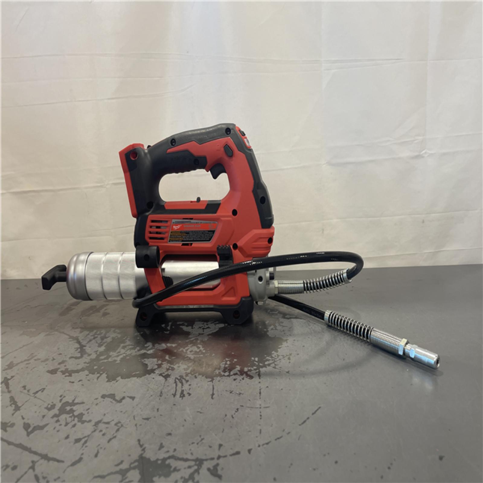 AS-IS- Milwaukee Tool 10,000 PSI 14 Oz Battery-Operated Grease Gun - 48 Flexible Hose, 31 Strokes/oz