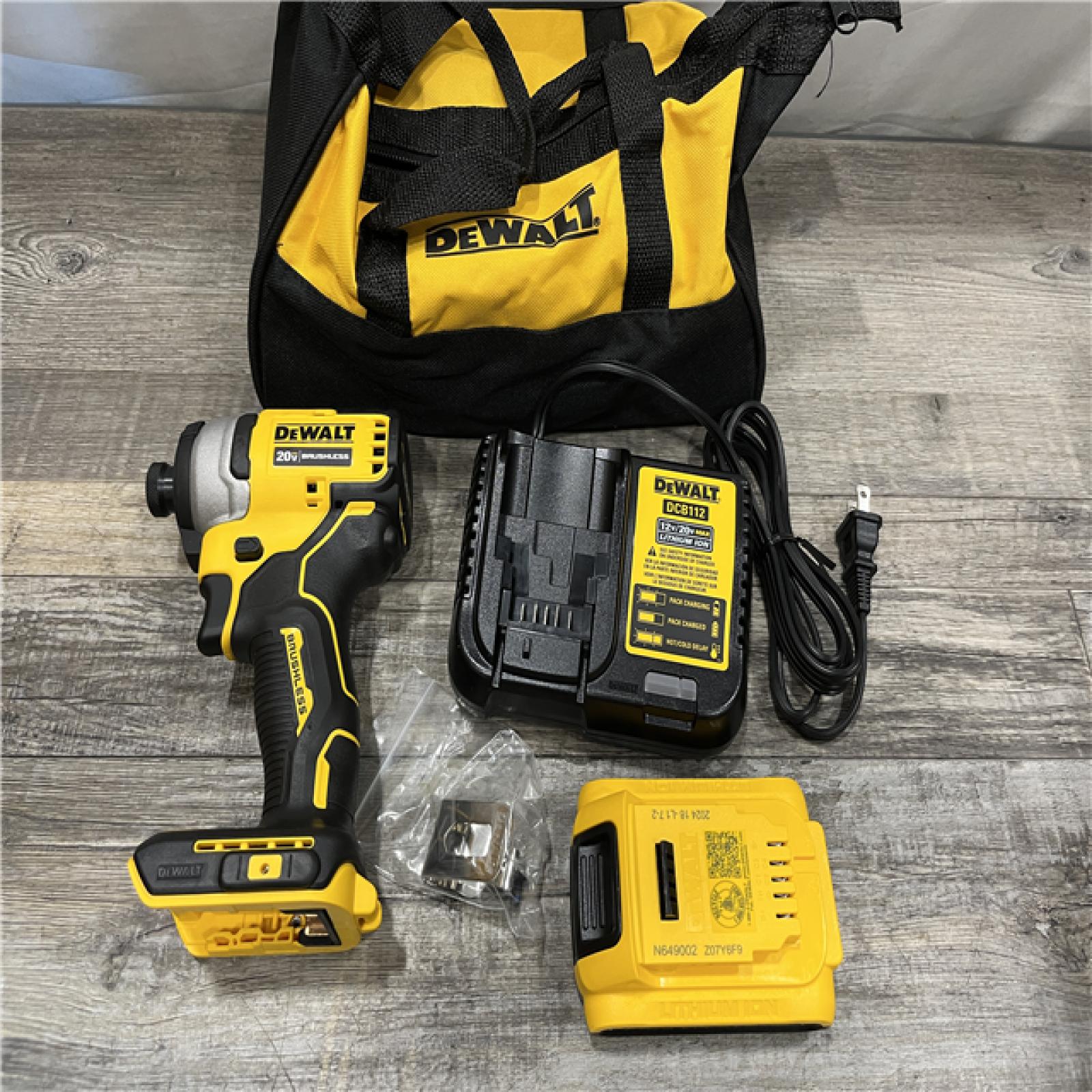 AS-IS DEWALT Atomic 20V Max Lithium-Ion Brushless Cordless Compact 1/4 in. Impact Driver Kit