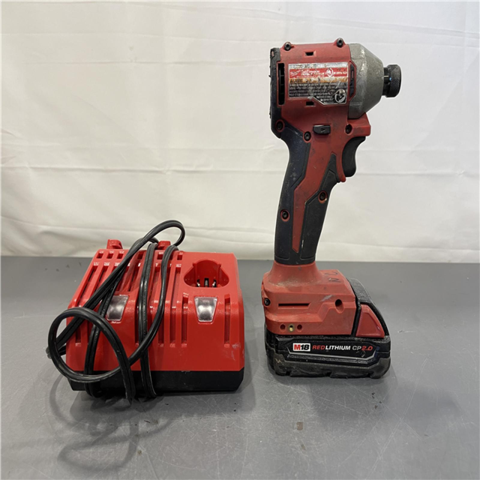 AS-IS - Milwaukee M18 18-Volt Lithium-Ion Compact Brushless Cordless 1/4 in. Impact Driver Kit