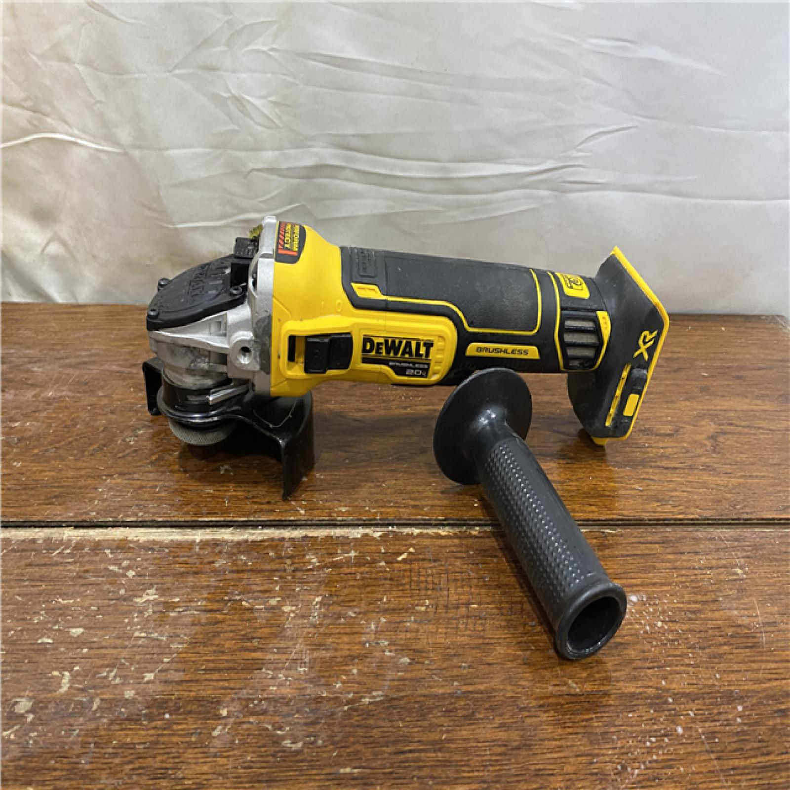 AS-IS DeWalt DCG405B 20V Max XR 4.5-Inch Slide Switch Small Angle Grinder (Tool Only)
