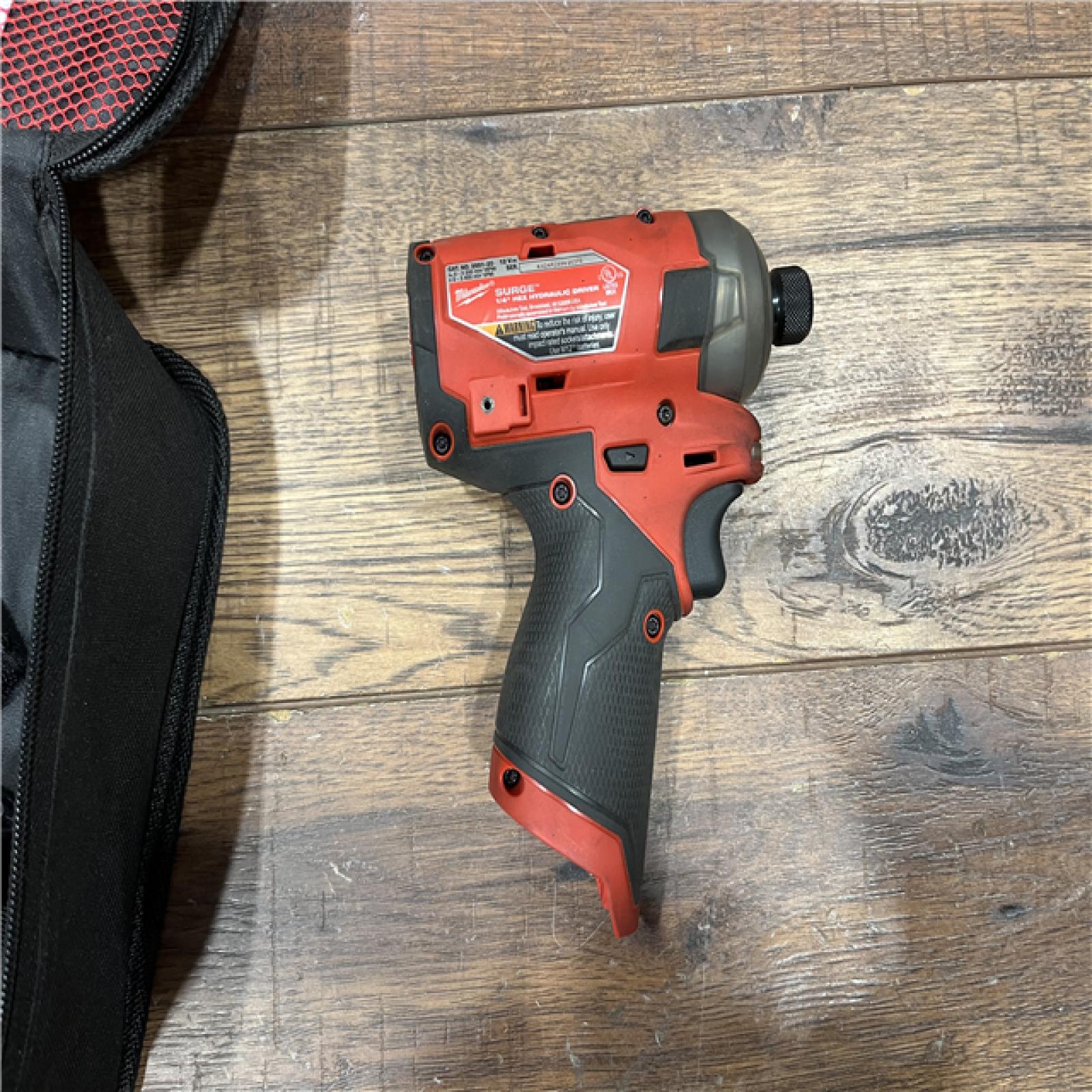 AS-IS M12 FUEL SURGE 12V Lithium-Ion Brushless Cordless 1/4 in. Hex Impact Driver Compact Kit W/Two 2.0Ah Batteries, Bag