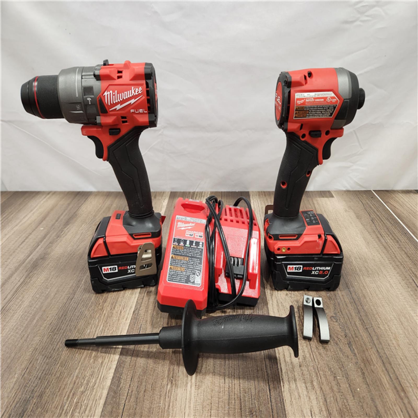 AS-IS - MILWAUKEE FUEL 18V Lithium-Ion Brushless Cordless Hammer Drill and Impact Driver Combo Kit (2-Tool) with 2 Batteries