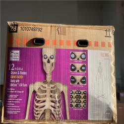 DALLAS LOCATION - Home Accents Holiday 12 ft. Grave & Bones Giant-Sized Skelly with LifeEyes™ LCD Eyes