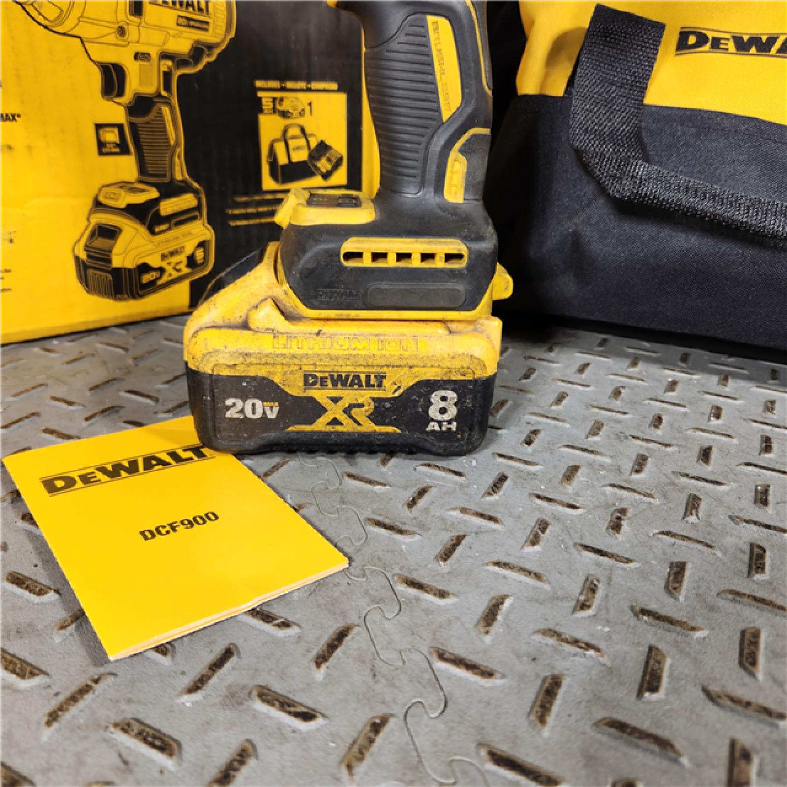 Houston location- AS-IS DeWalt 20 V 1/2 in. Cordless Brushless Impact Wrench W/Hog Ring Kit (Battery & Charger) Appears in used condition
