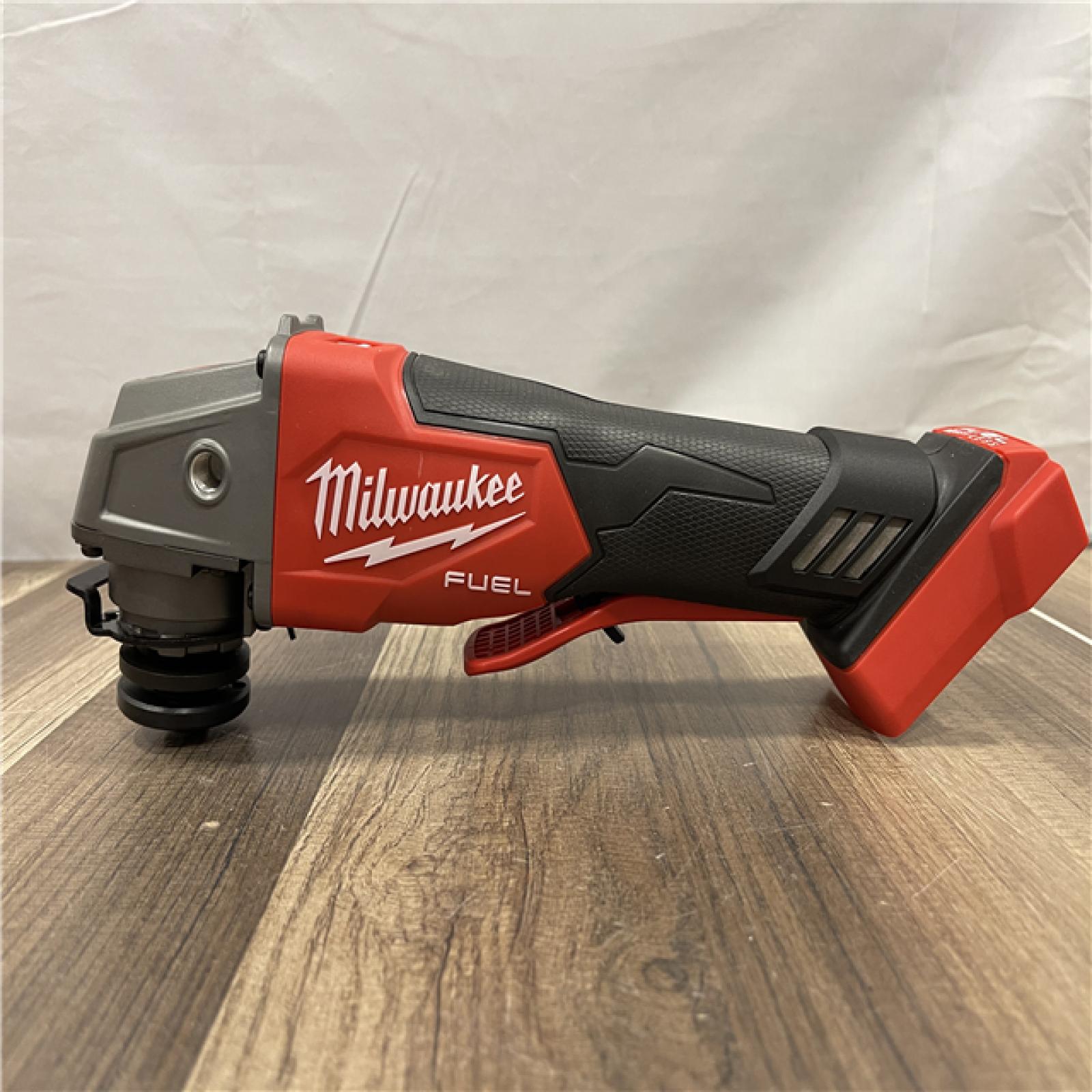 AS-IS Milwaukee FUEL 18V Lithium-Ion Brushless Cordless 4-1/2 in./5 in. Grinder w/Paddle Switch (Tool-Only)
