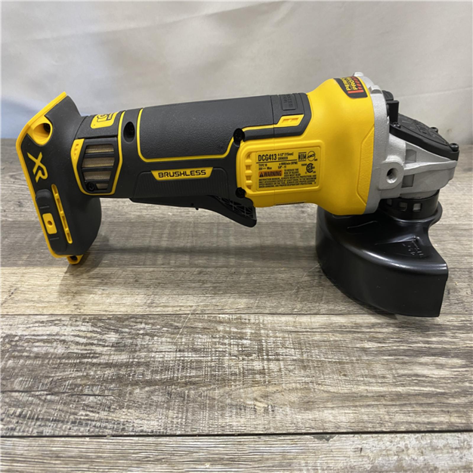 AS-IS DEWALT 20V MAX XR Cordless Brushless 4.5 in. Paddle Switch Small Angle Grinder with Kickback Brake (Tool Only)