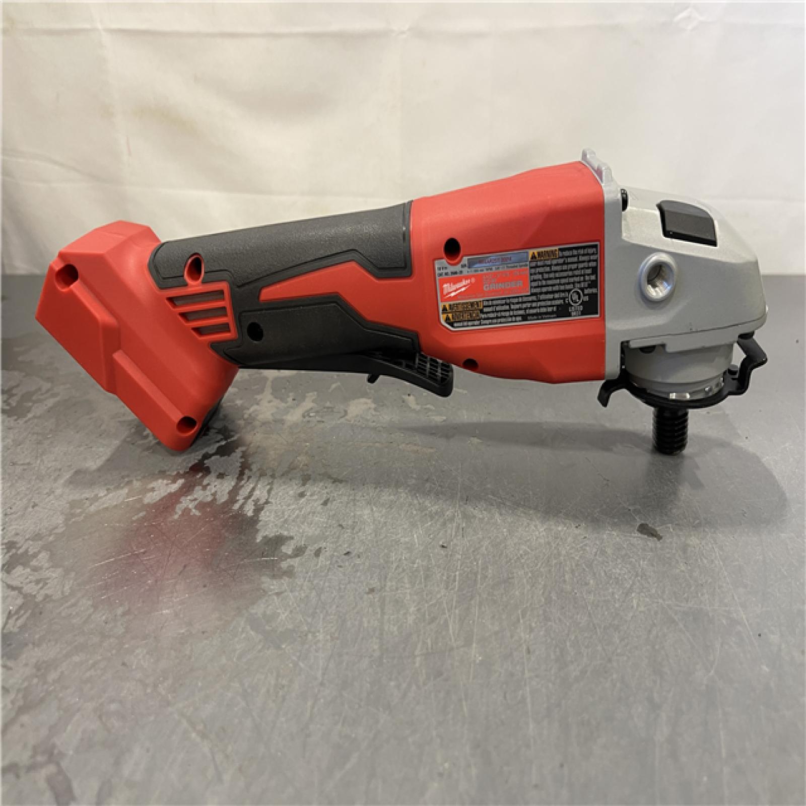 AS-IS - Milwaukee M18 18V Lithium-Ion Brushless Cordless 4-1/2 in./5 in. Grinder w/Paddle Switch