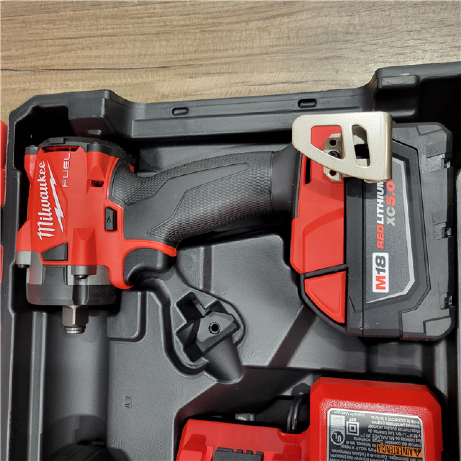 AS-IS  Milwaukee . 18V Brushless Compact Impact Wrench with Friction Ring Kit, Red & Black