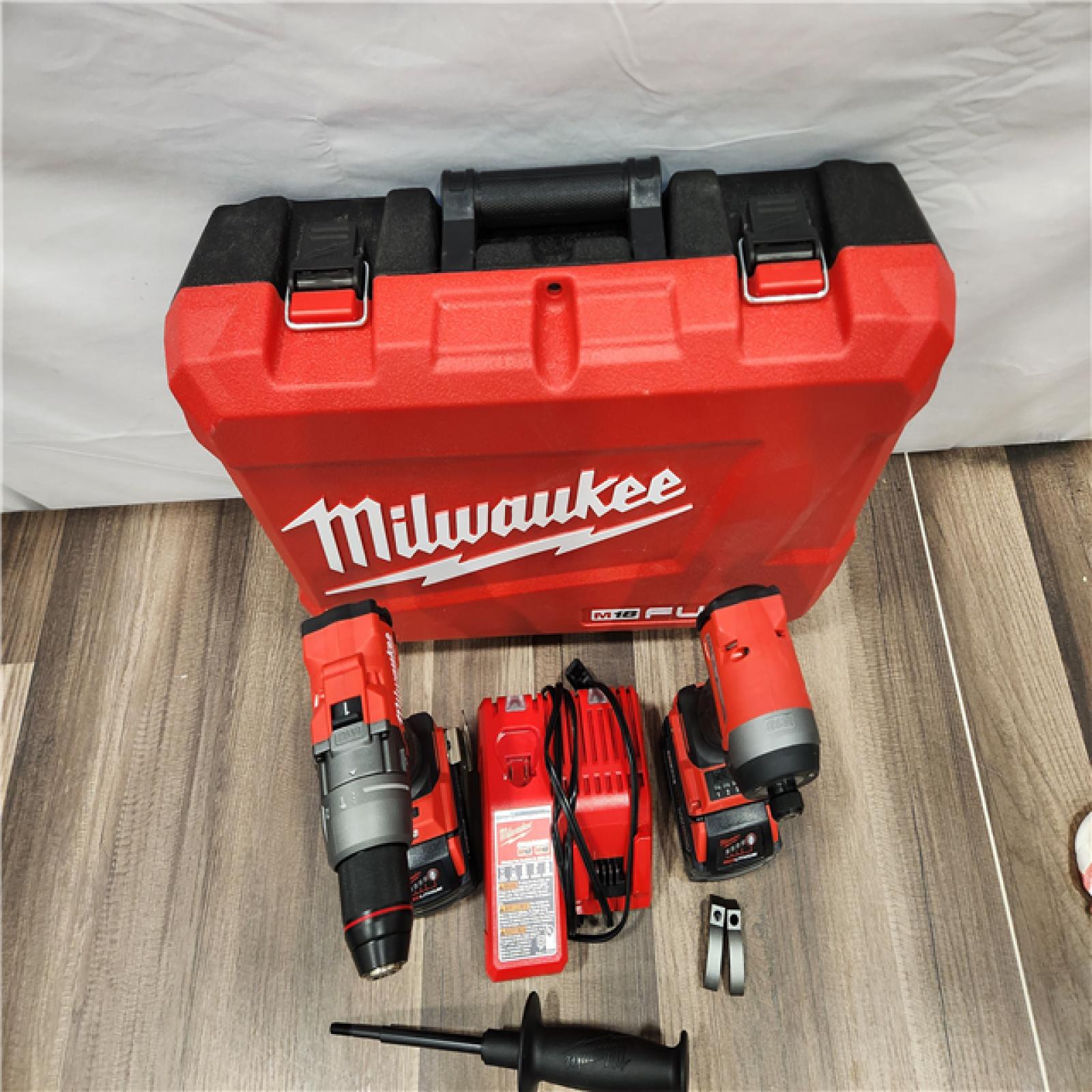 AS-IS - MILWAUKEE FUEL 18V Lithium-Ion Brushless Cordless Hammer Drill and Impact Driver Combo Kit (2-Tool) with 2 Batteries