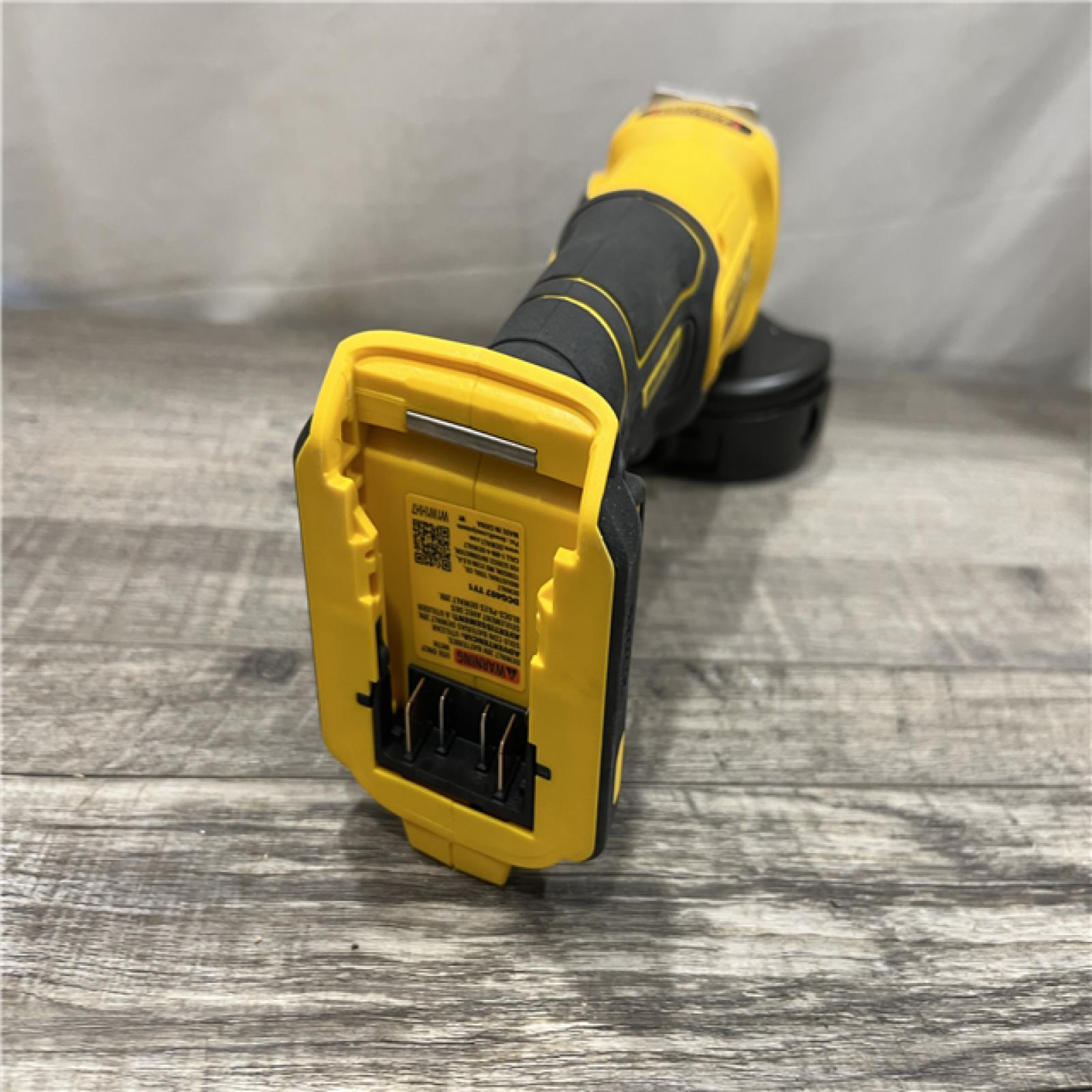 AS-IS DEWALT 20-Volt MAX Cordless Brushless 4-1/2 in. Angle Grinder with Slide Switch (Tool Only)