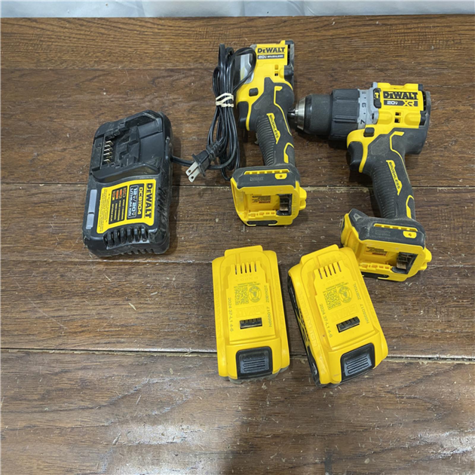 AS-IS DEWALT 20V MAX XR Hammer Drill and ATOMIC Impact Driver 2 Tool Cordless Combo Kit with (2) 4.0Ah Batteries, Charger, and Bag