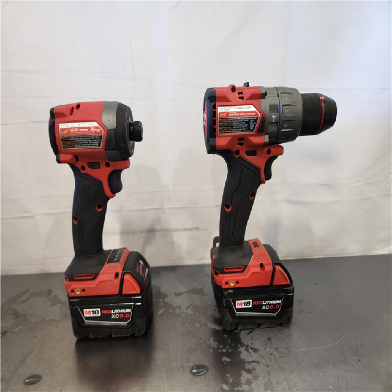 AS-IS- Milwaukee FUEL 18V Lithium-Ion Brushless Cordless Hammer Drill and Impact Driver Combo Kit