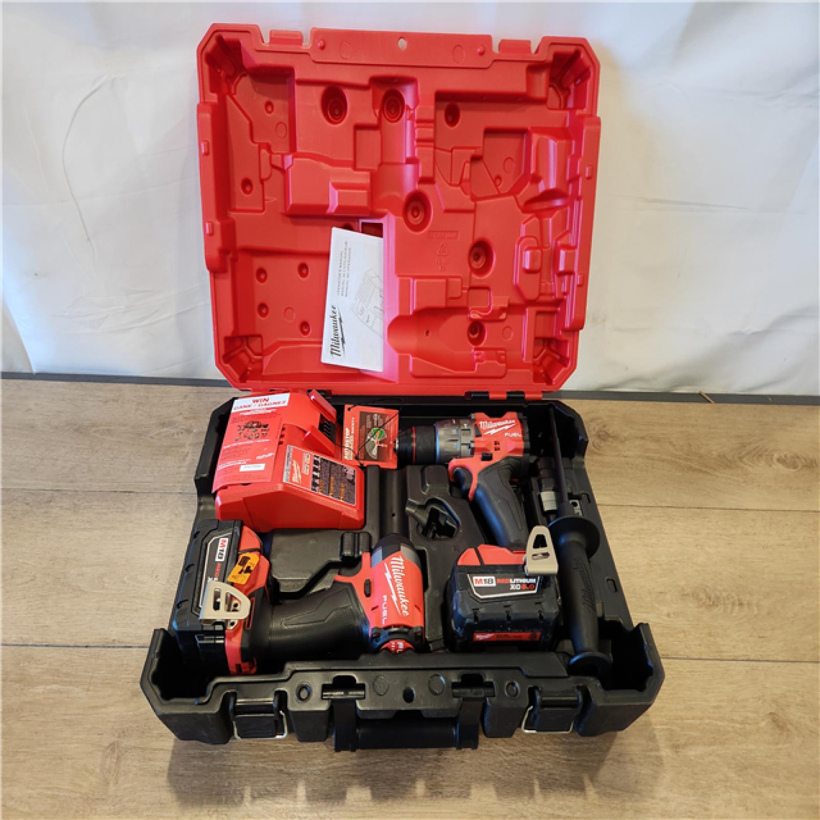 AS-IS- Milwaukee  FUEL 18V Lithium-Ion Brushless Cordless Hammer Drill and Impact Driver Combo Kit