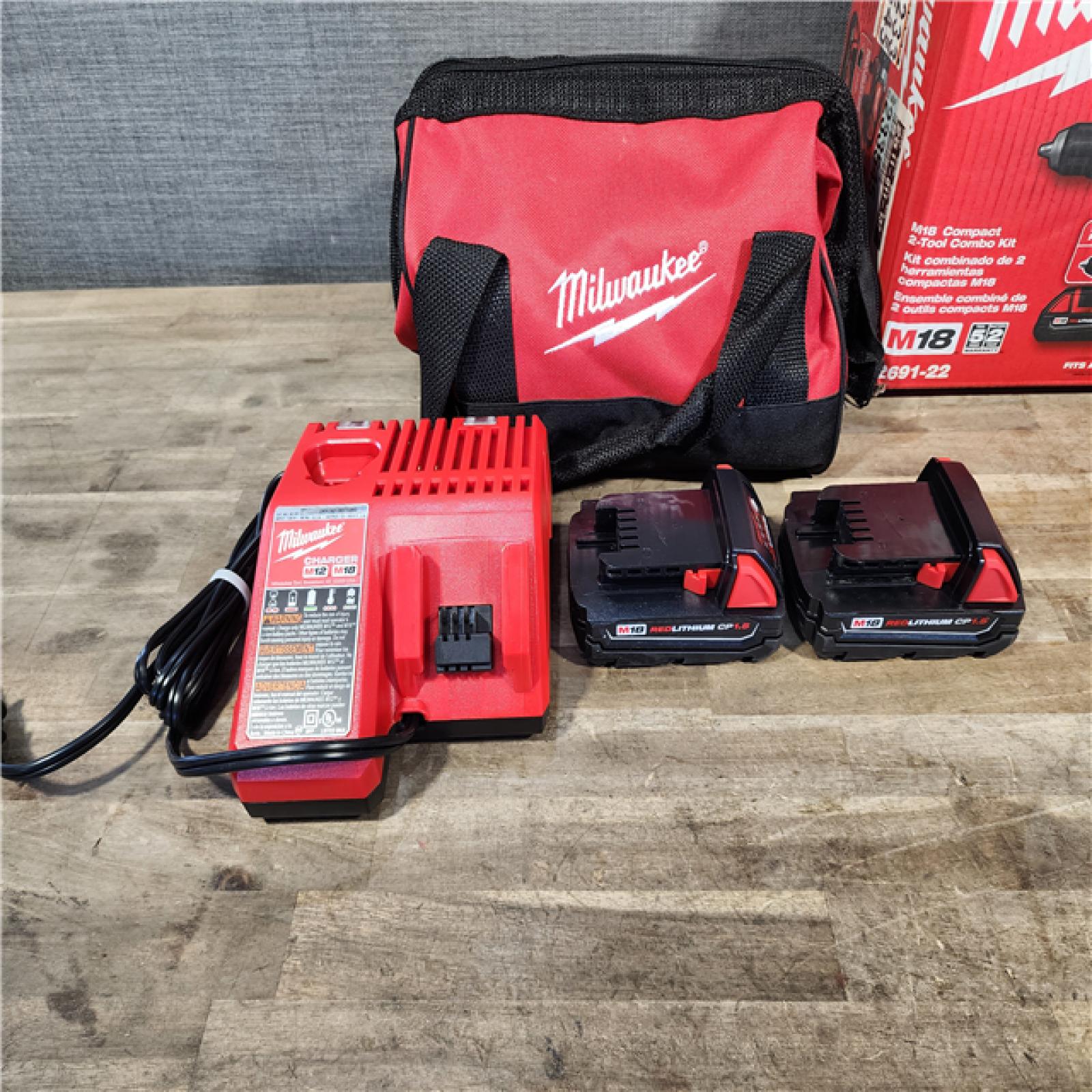 HOUSTON LOCATION - AS-IS Milwaukee 18V Cordless Brushed 2-Tool Drill/Driver and Impact Driver Kit