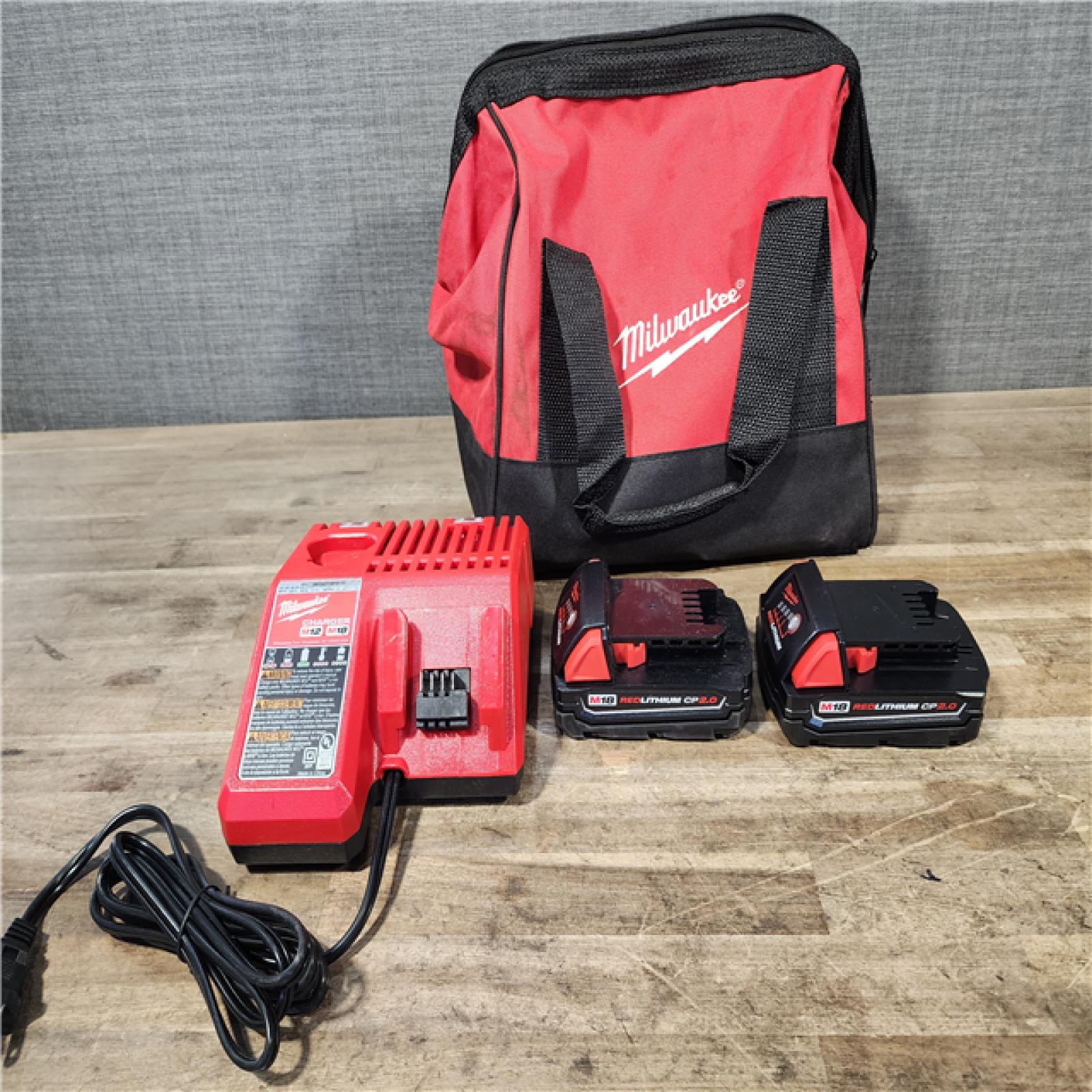 HOUSTON LOCATION - AS-IS M18 18-Volt Lithium-Ion Brushless Cordless Compact Hammer Drill/Impact Combo Kit (2-Tool) with (2) Batteries  Bag