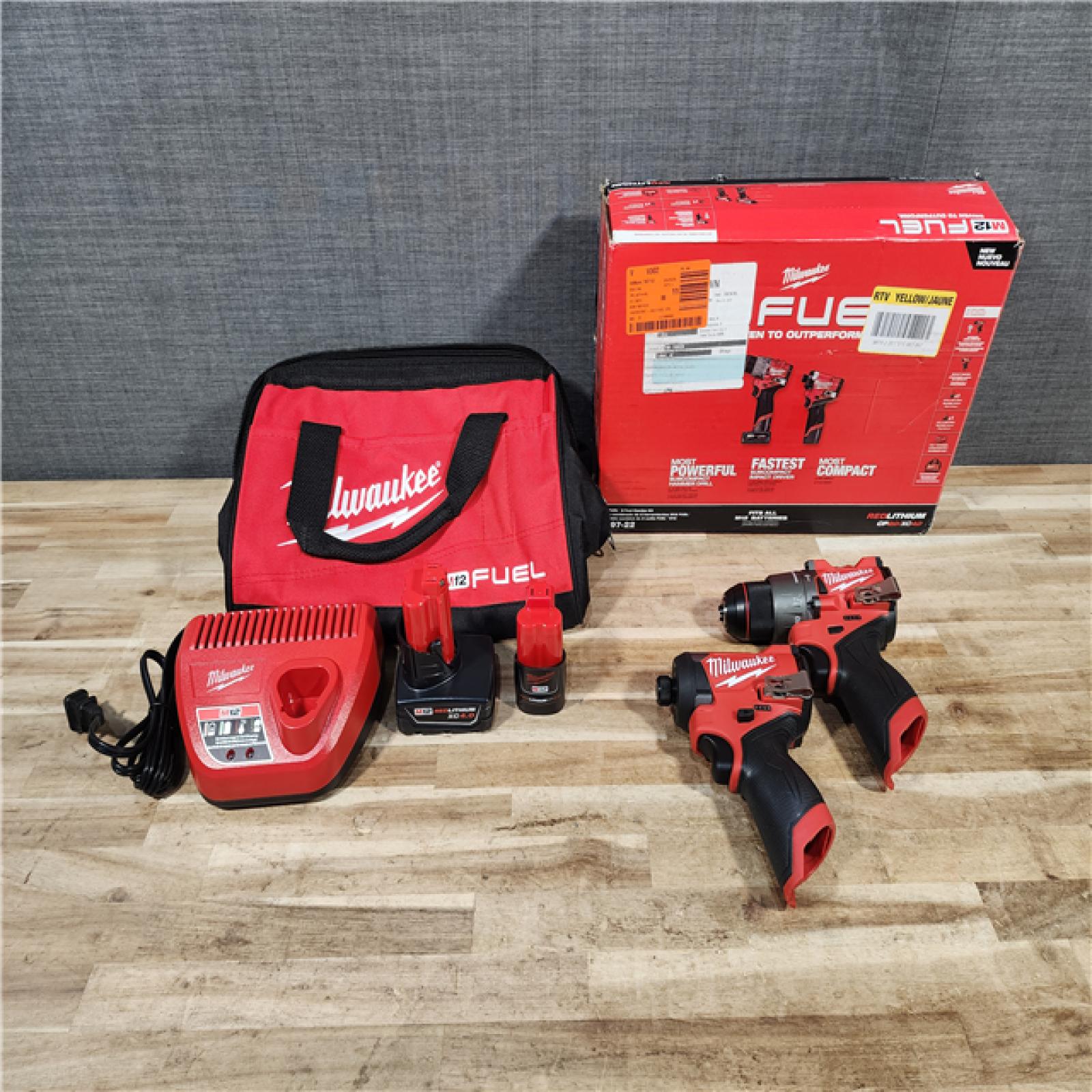 HOUSTON LOCATION - AS-IS Milwaukee  FUEL 12-Volt Lithium-Ion Brushless Cordless Hammer Drill and Impact Driver Combo Kit