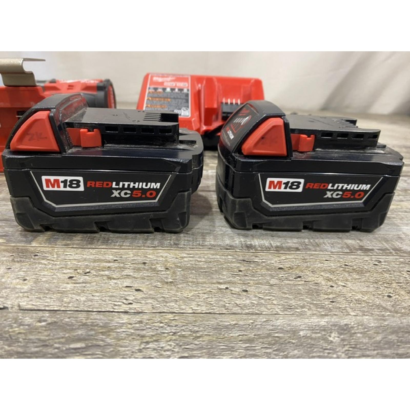 AS-IS Milwaukee FUEL 18V Lithium-Ion Brushless Cordless 1/2 in. Hammer Drill Driver Kit