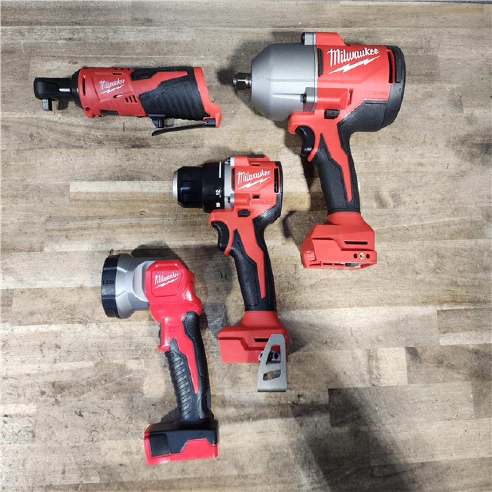 HOUSTON LOCATION - AS-IS MILWAUKEE 4 TOOL COMBO KIT W/ (2) BATTERY & CHARGER