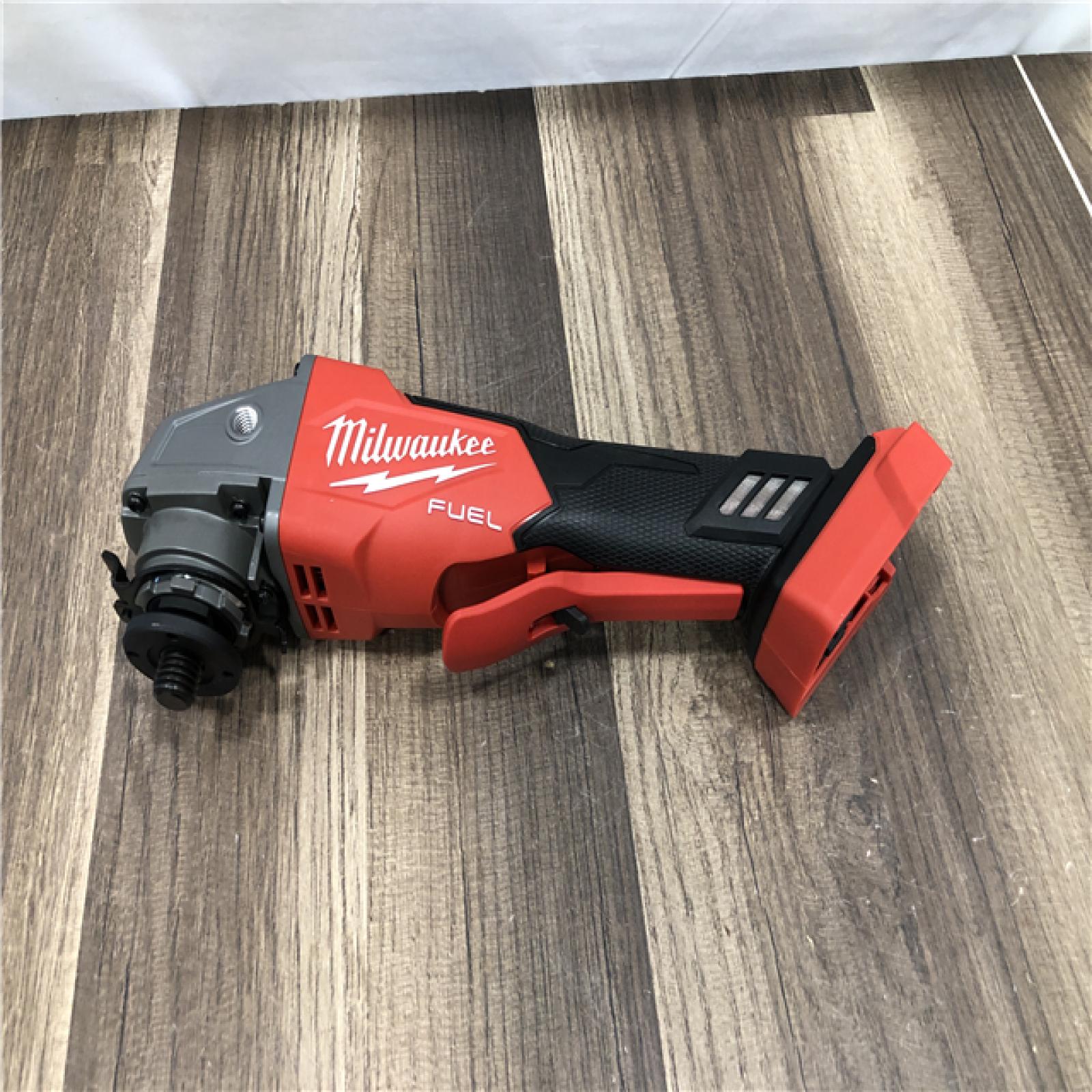 AS-IS Milwaukee  FUEL 18V Lithium-Ion Brushless Cordless 4-1/2 in./5 in. Grinder w/Paddle Switch (Tool-Only)