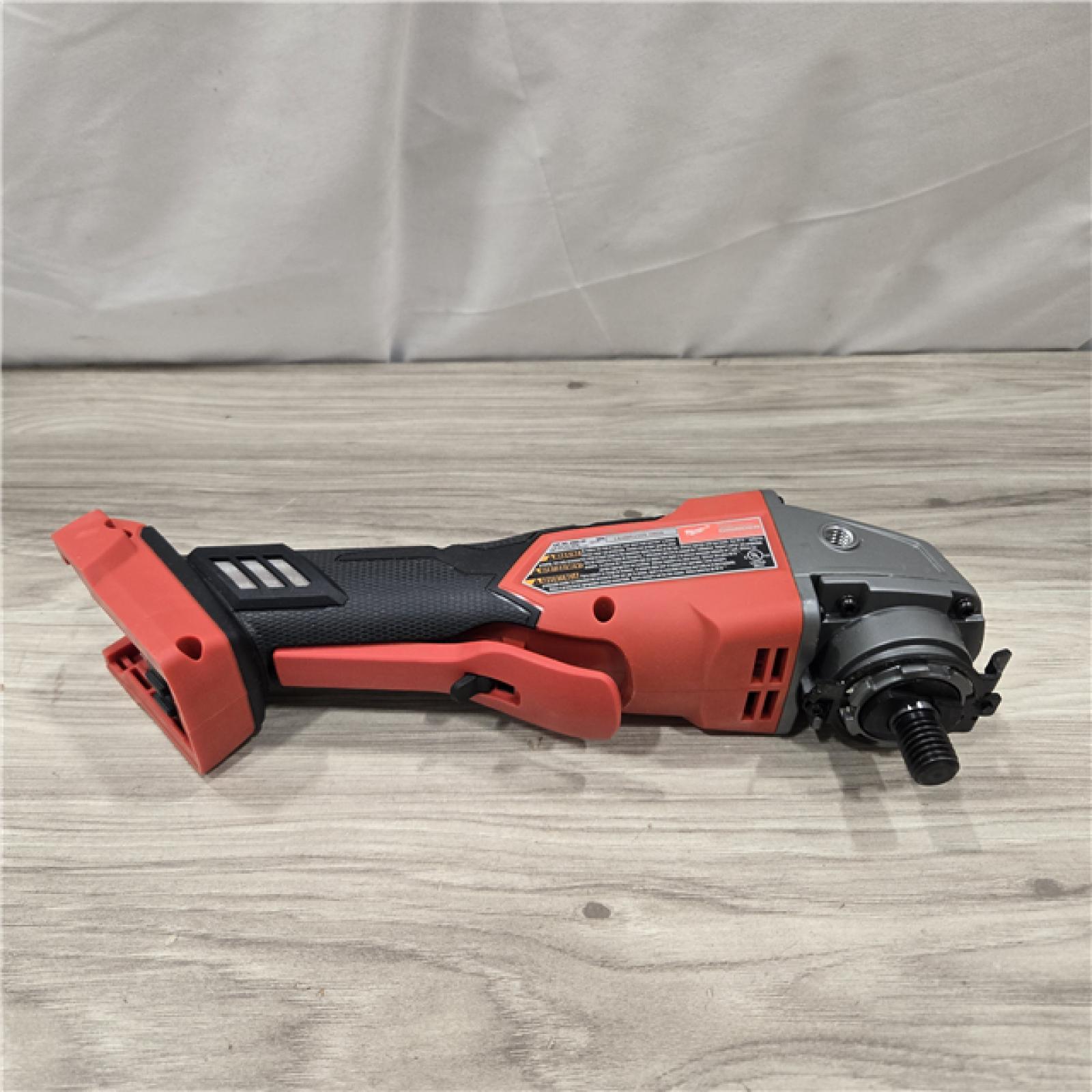 AS-IS Milwaukee 2880-20 FUEL 18V Cordless 4-1/2 in./5 in. Grinder (Tool-Only)