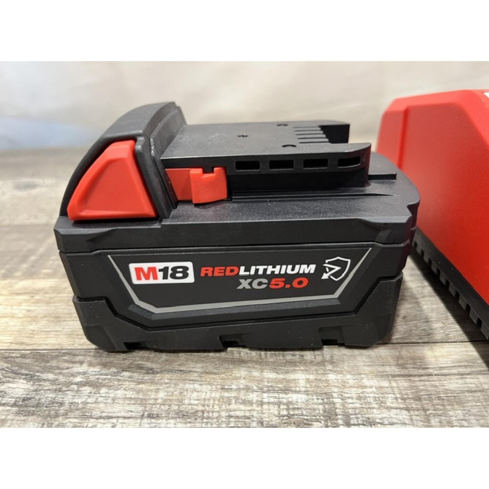 AS-IS Milwaukee 18-Volt Lithium-Ion XC Starter Kit with One 5.0Ah Battery and Charger