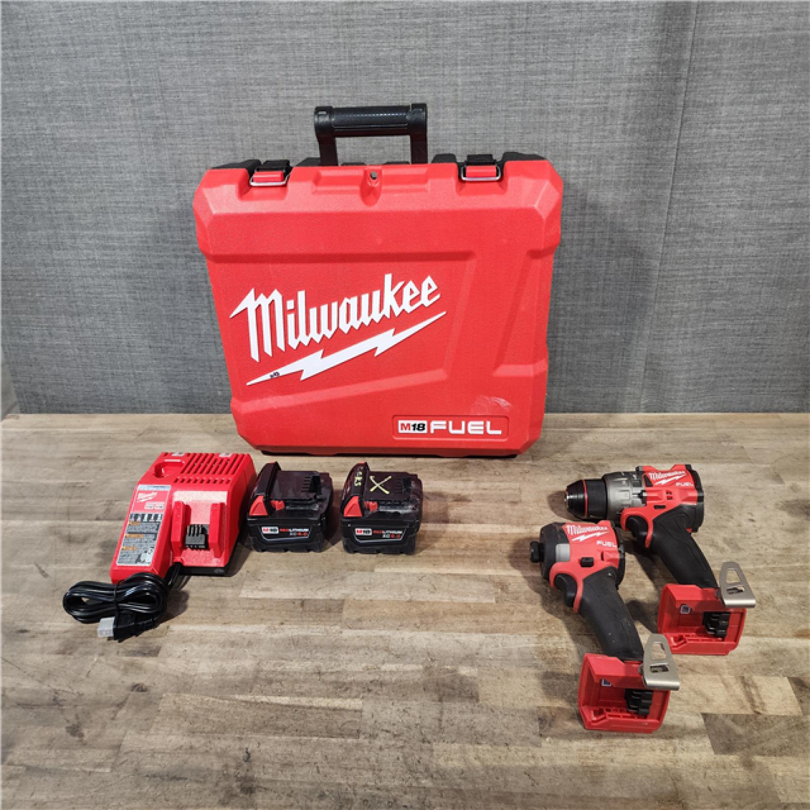 HOUSTON LOCATION - AS-IS MILWAUKEE FUEL 18V Lithium-Ion Brushless Cordless Hammer Drill and Impact Driver Combo Kit