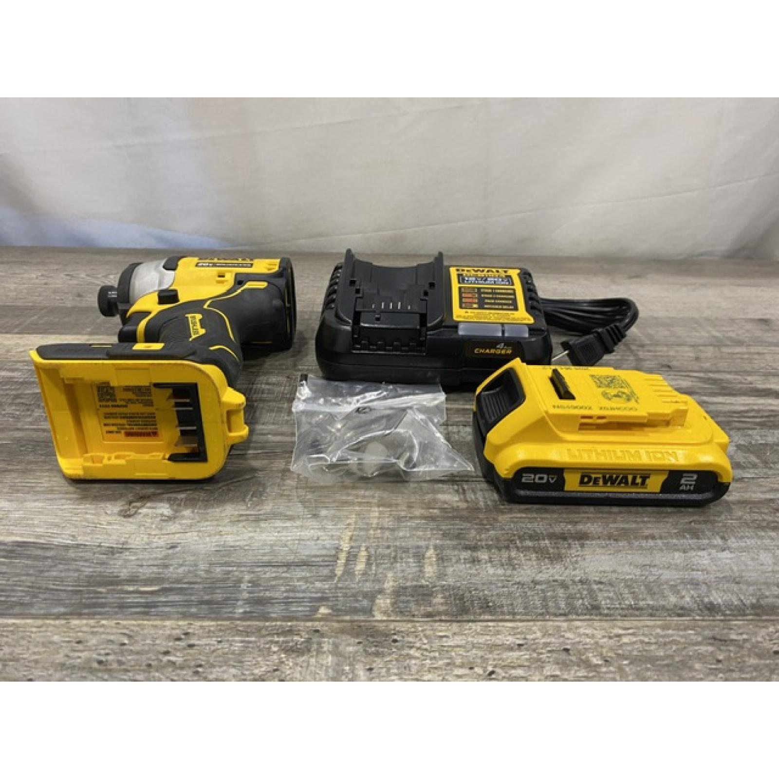 AS-IS DEWALT Atomic 20V Max Lithium-Ion Brushless Cordless Compact 1/4 in. Impact Driver Kit