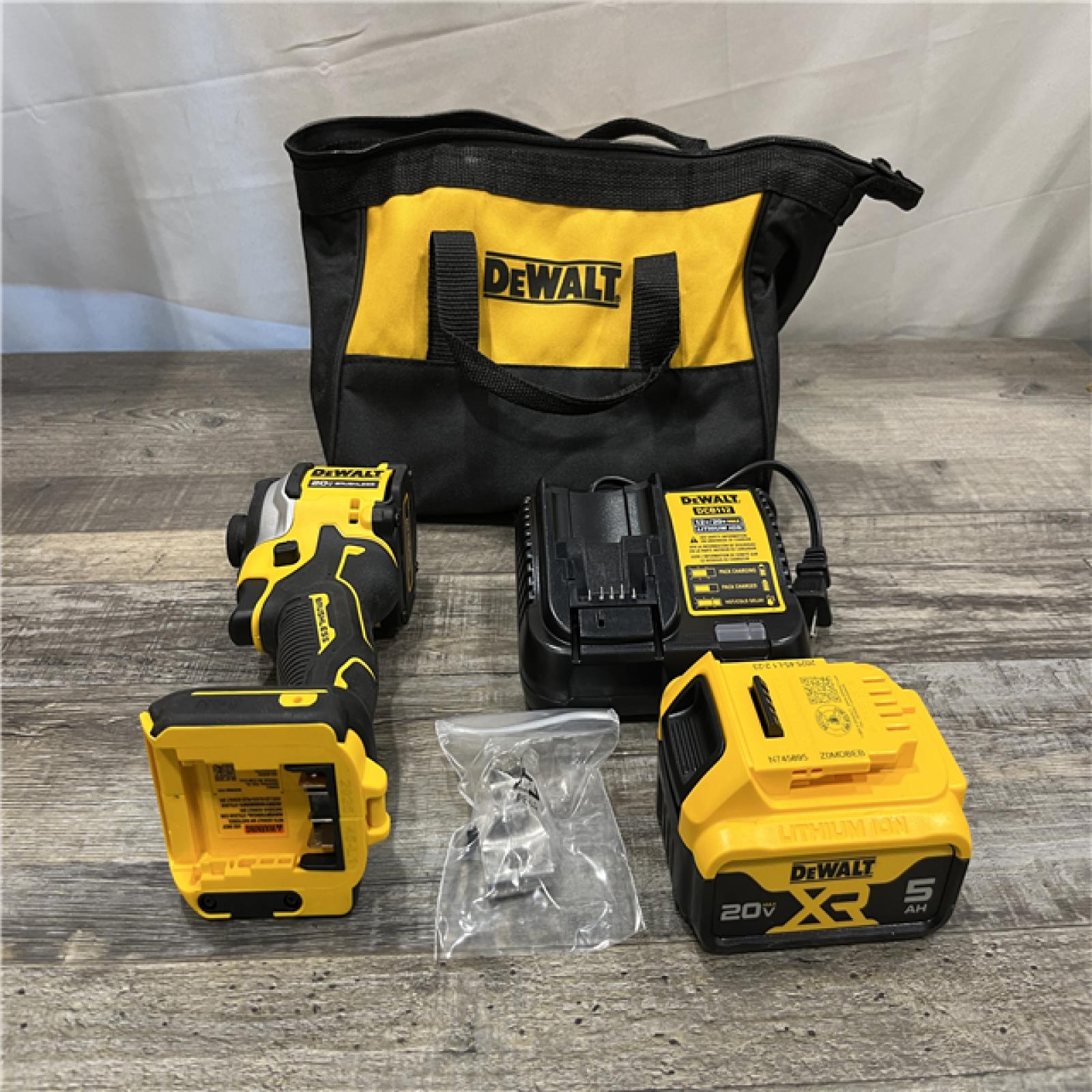 AS-IS DEWALT ATOMIC 20V MAX Lithium-Ion Cordless 1/4 in. Brushless Impact Driver Kit