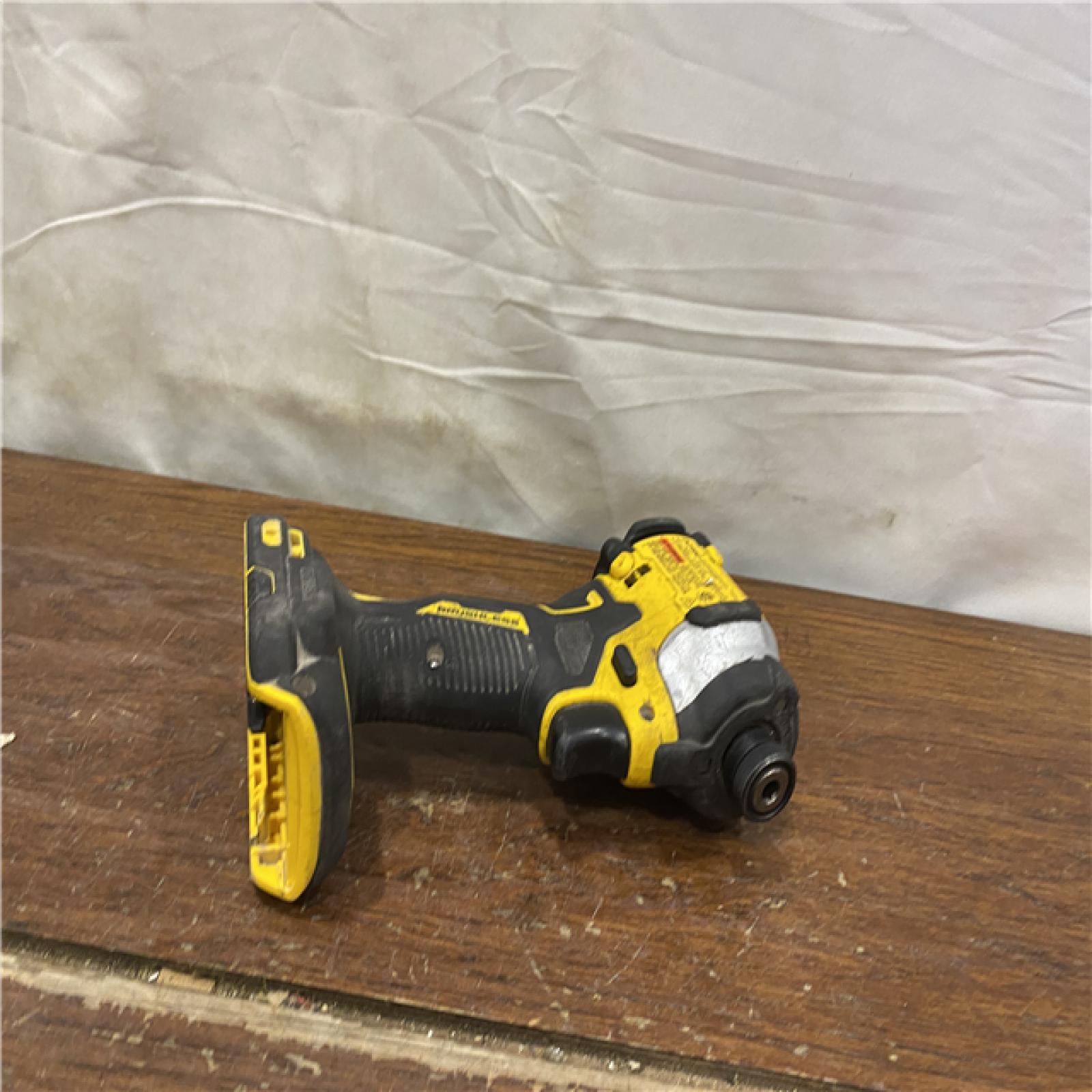 AS-IS DeWalt 20V MAX ATOMIC 1/4 in. Cordless Brushless 3-Speed Impact Driver Kit (Battery & Charger)