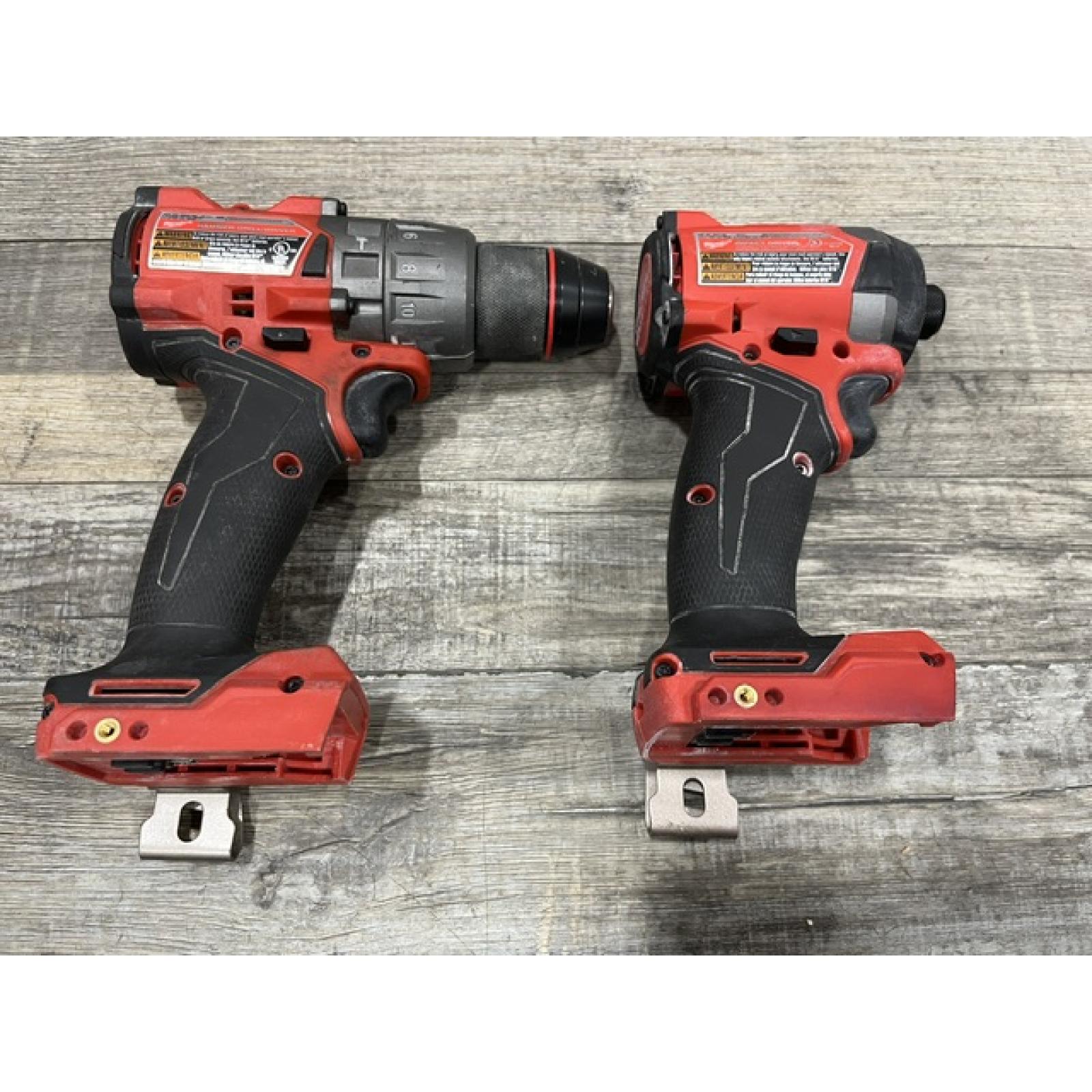 AS-IS Milwaukee FUEL 18V Lithium-Ion Brushless Cordless Hammer Drill and Impact Driver Combo Kit