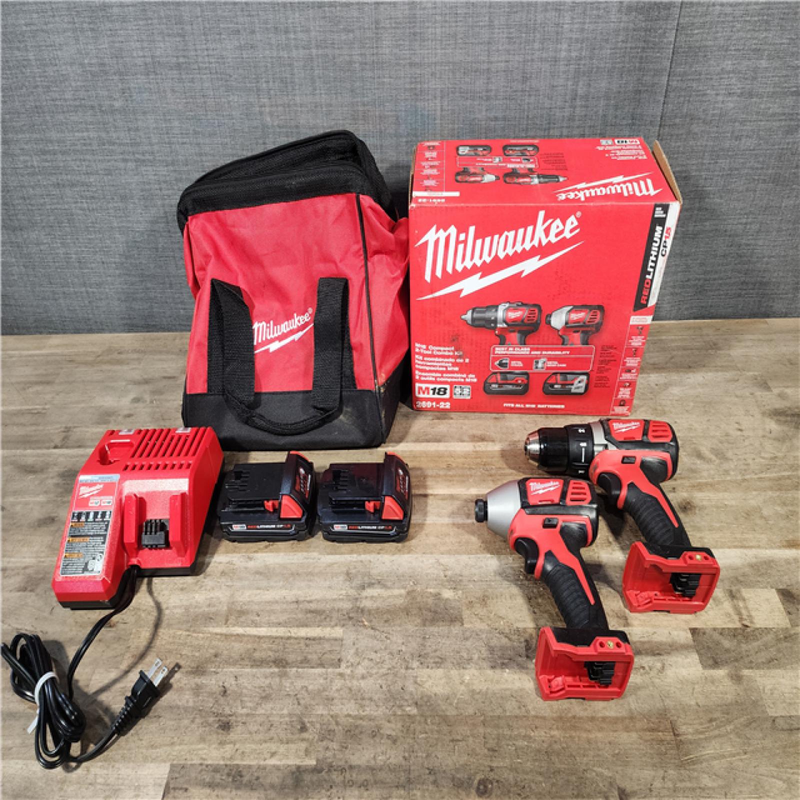 HOUSTON LOCATION - AS-IS Milwaukee 18V Cordless Brushed 2-Tool Drill/Driver and Impact Driver Kit