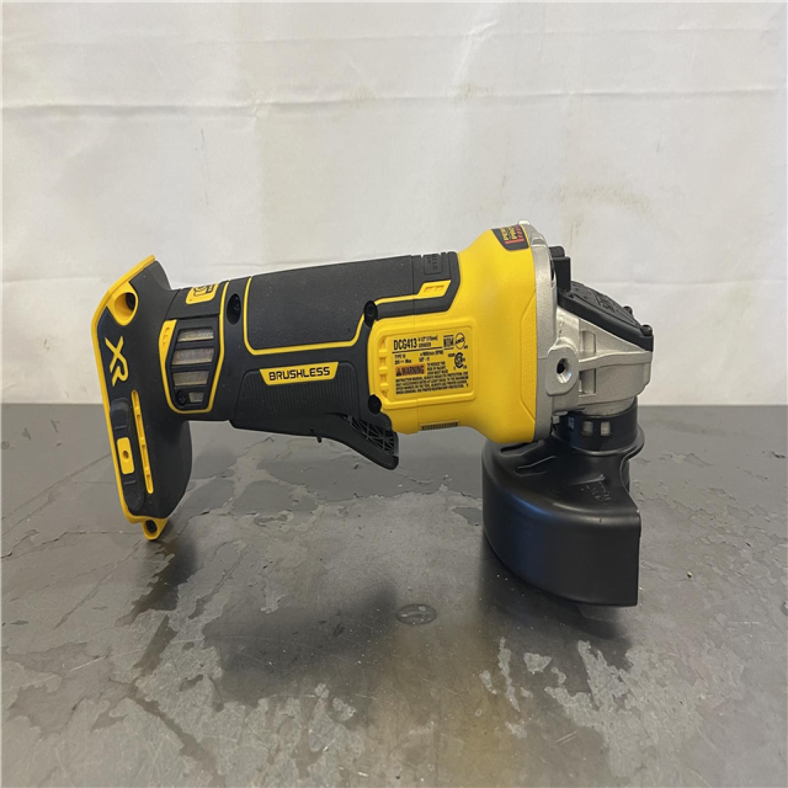 AS-IS- DeWalt 20-Volt MAX XR Cordless Brushless 4-1/2 in. Paddle Switch Small Angle Grinder (Tool-Only)