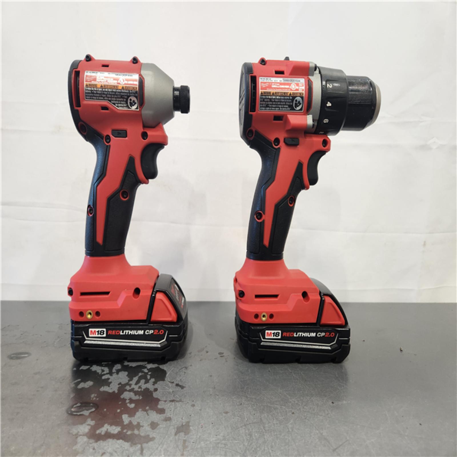 AS-IS- Milwaukee M18 18V Lithium-Ion Brushless Cordless Compact Drill/Impact Combo Kit (2-Tool) W/(2) 2.0 Ah Batteries  Charger & Bag