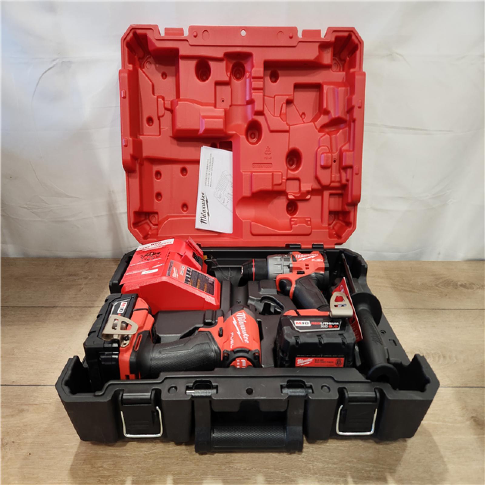 AS-IS- Milwaukee FUEL 18V Lithium-Ion Brushless Cordless Hammer Drill and Impact Driver Combo Kit