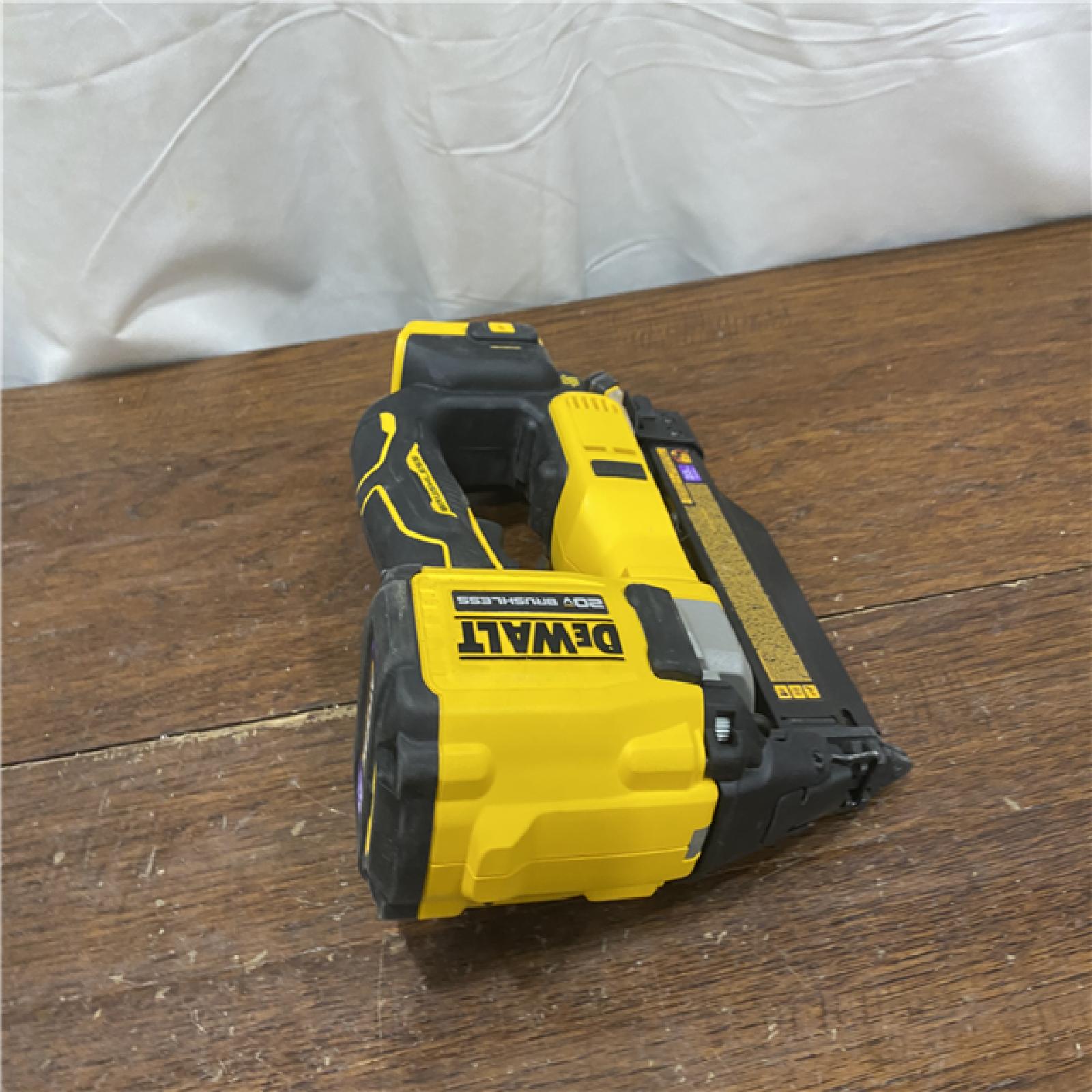 AS-IS DEWALT ATOMIC 20V MAX Lithium Ion Cordless 23 Gauge Pin Nailer Kit with 3.0Ah Battery and Charger