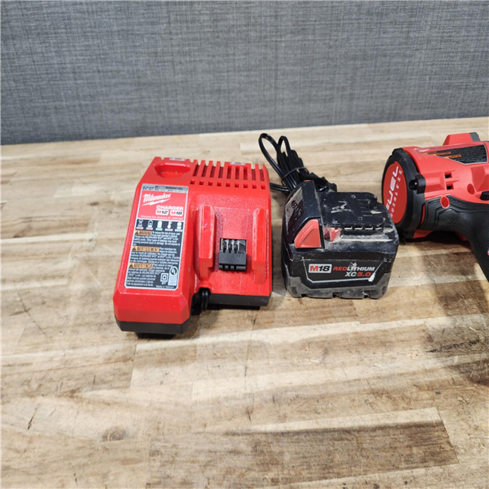 HOUSTON LOCATION - AS - IS Milwaukee M18 FUEL Brushless Cordless High-Torque 1/2 in. Impact Wrench W/Friction Ring Kit