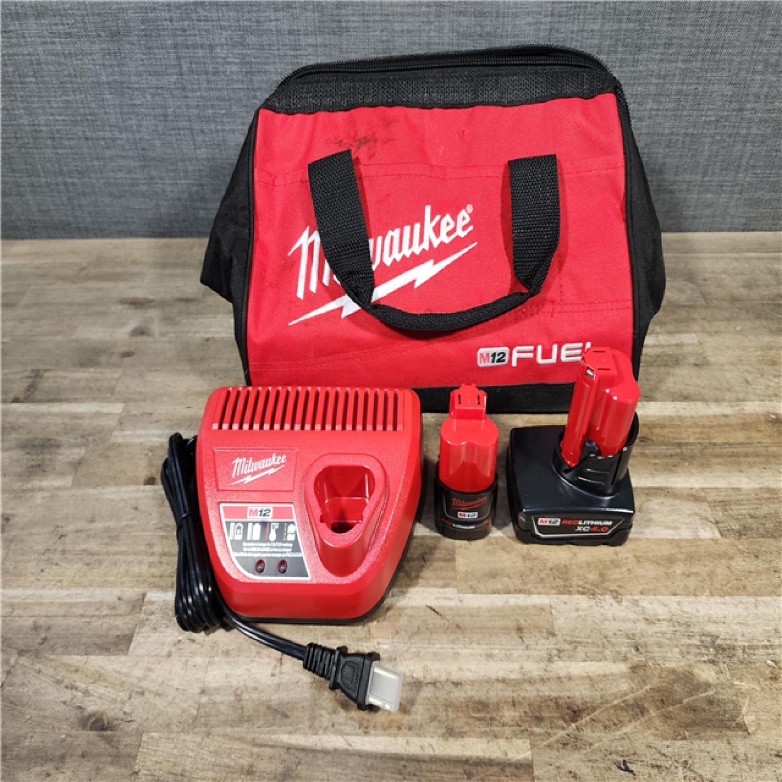 HOUSTON LOCATION - AS-IS Milwaukee FUEL 12-Volt Lithium-Ion Brushless Cordless Hammer Drill and Impact Driver Combo Kit