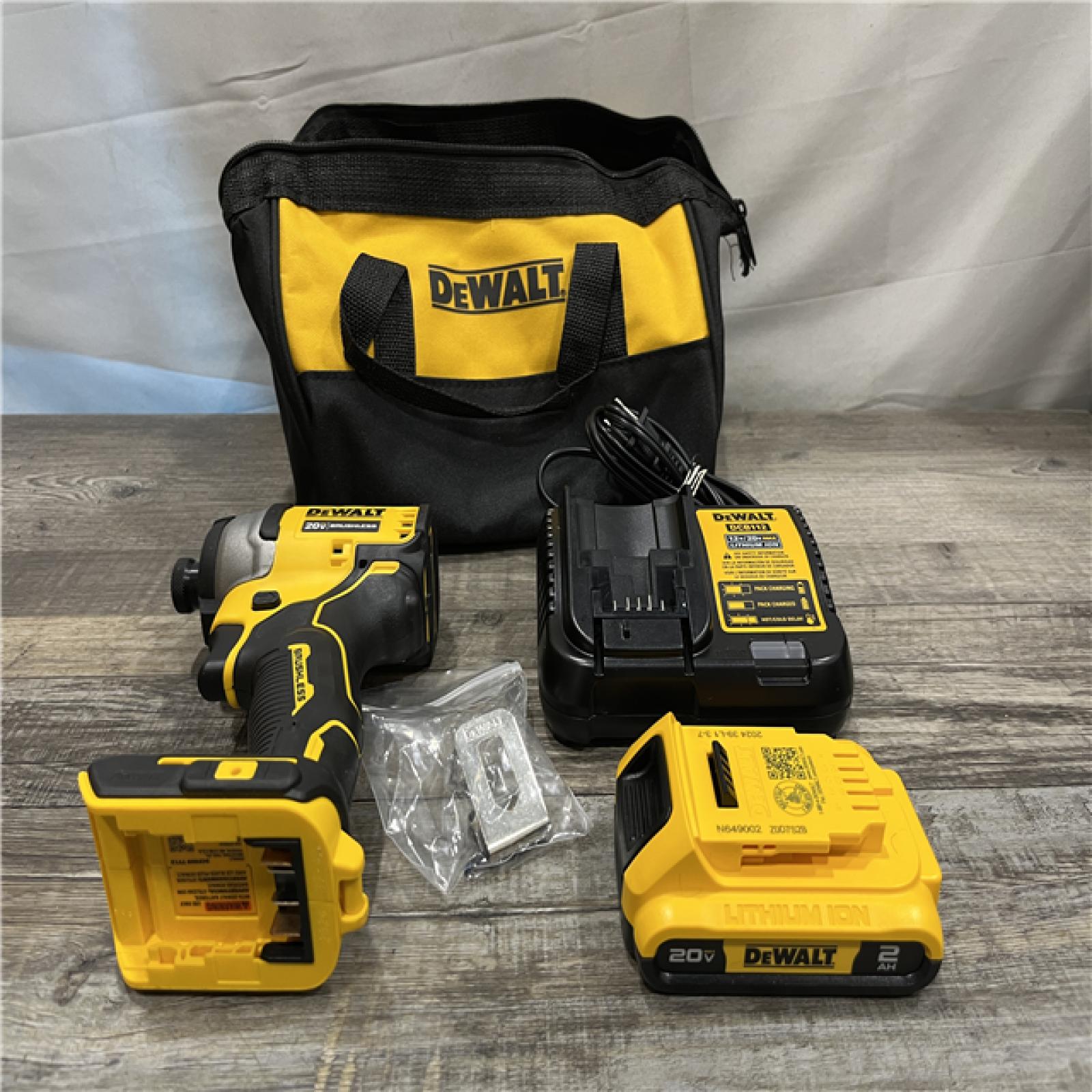 AS-IS DEWALT Atomic 20V Max Lithium-Ion Brushless Cordless Compact 1/4 in. Impact Driver Kit