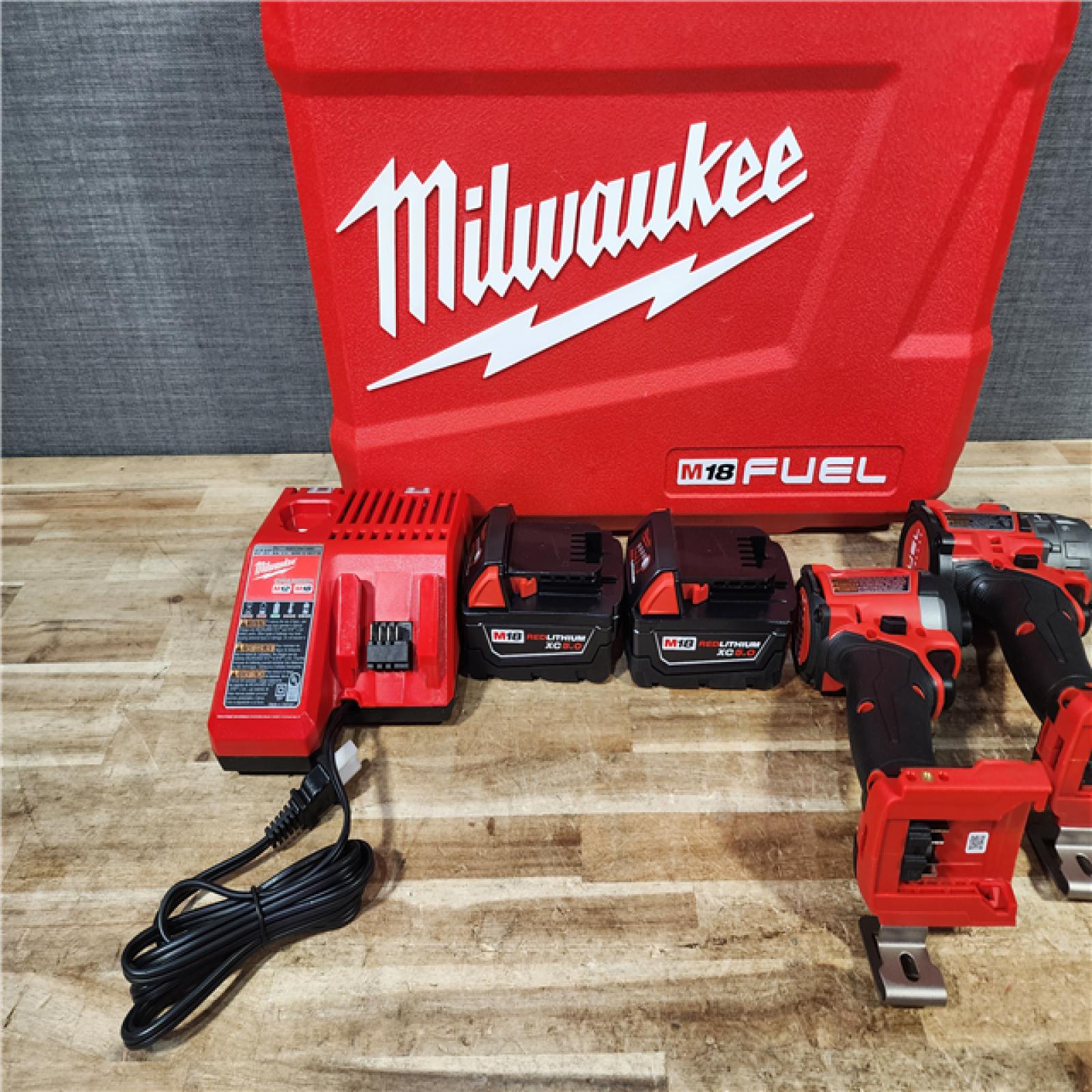 HOUSTON LOCATION - AS - IS Milwaukee FUEL 18V Lithium-Ion Brushless Cordless Hammer Drill and Impact Driver Combo Kit