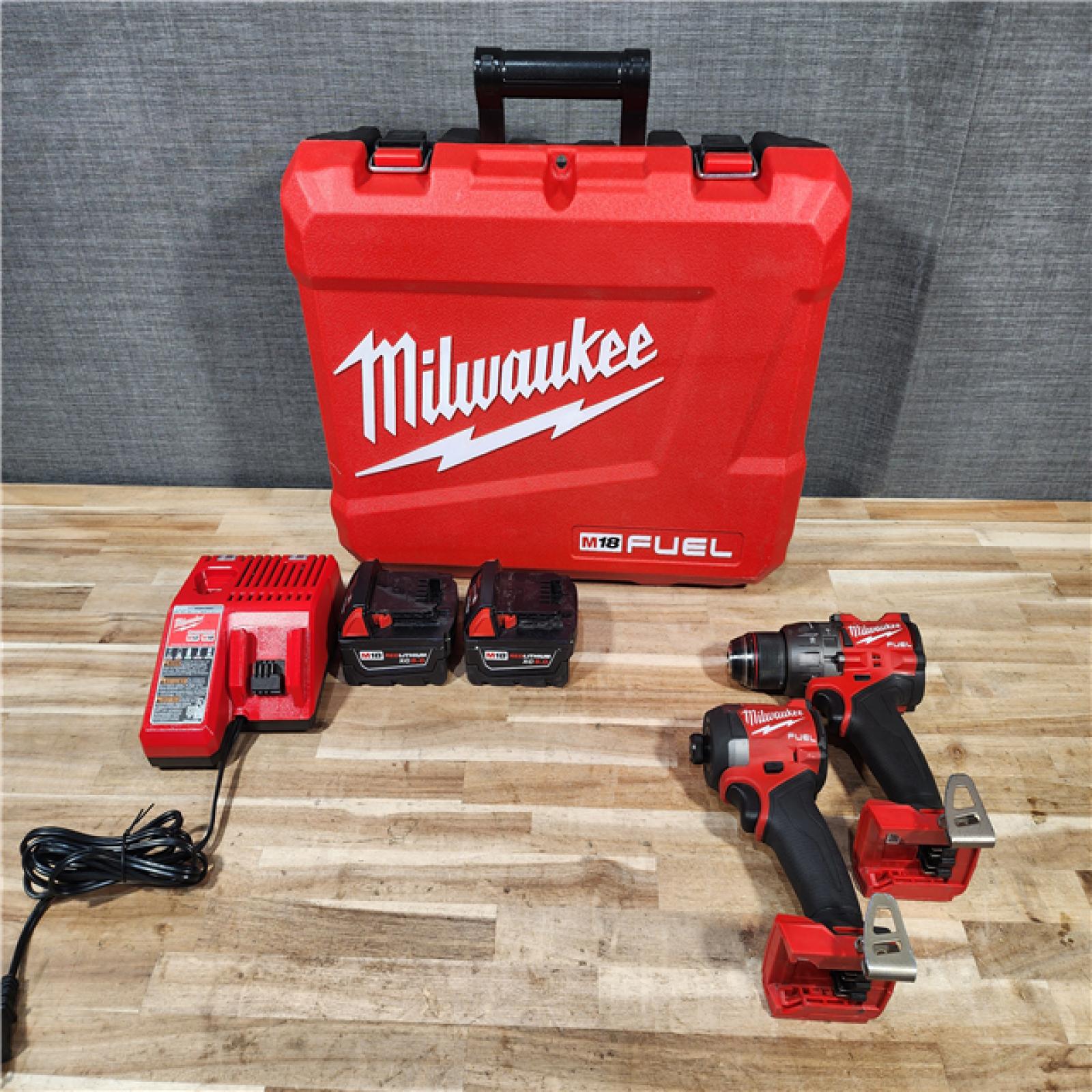 HOUSTON LOCATION - AS-IS Milwaukee FUEL 18V Lithium-Ion Brushless Cordless Hammer Drill and Impact Driver Combo Kit