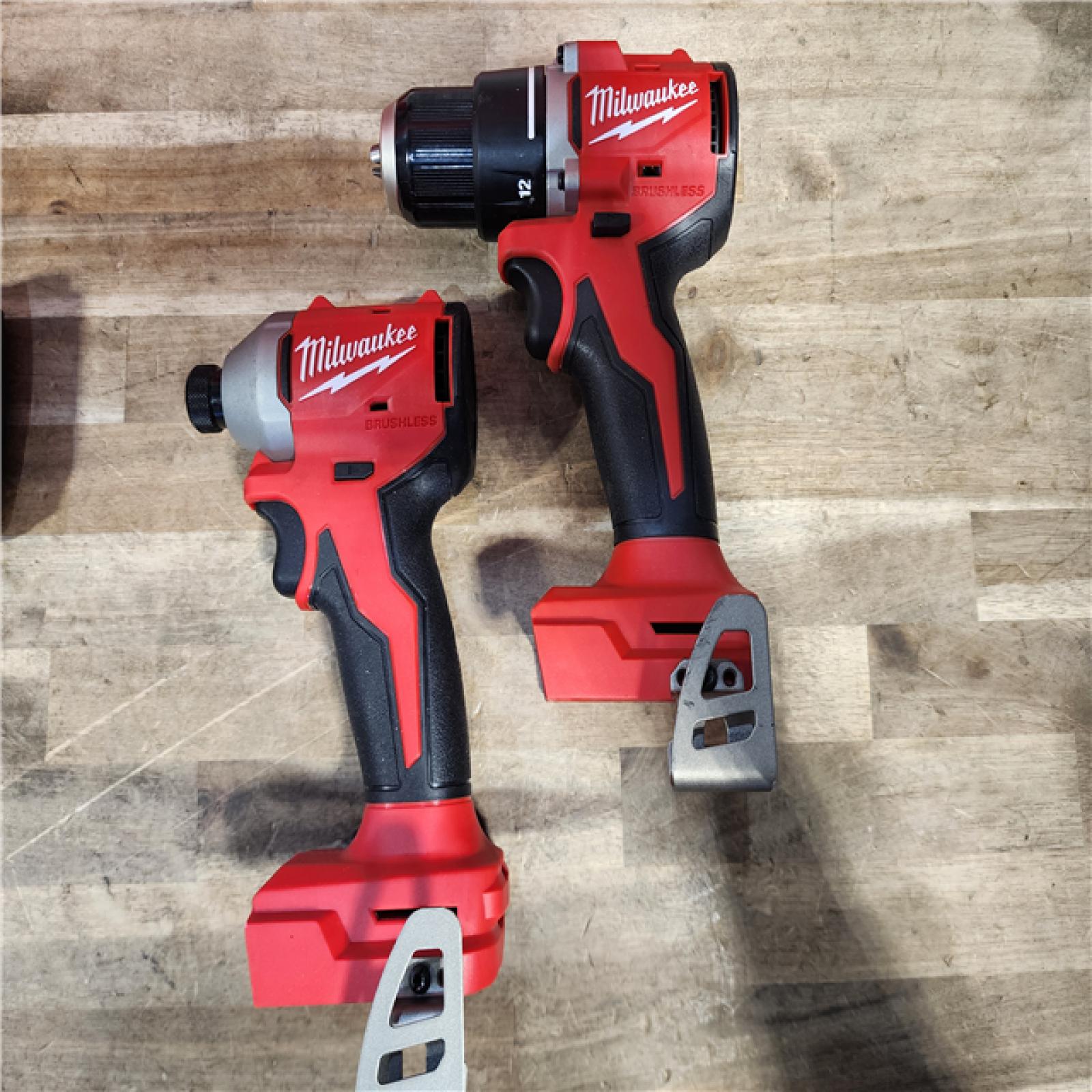 HOUSTON LOCATION - AS-IS Milwaukee M18 18V Lithium-Ion Brushless Cordless Compact Drill/Impact Combo Kit (2-Tool) W/(2) 2.0 Ah Batteries, Charger & Bag