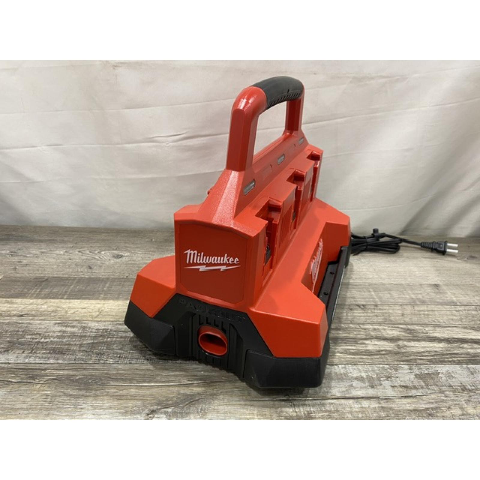 AS-IS Milwaukee 18V Lithium-Ion REDLITHIUM FORGE Starter Kit with (2) 12.0 Ah Battery Pack and PACKOUT 6-Port Rapid Charger