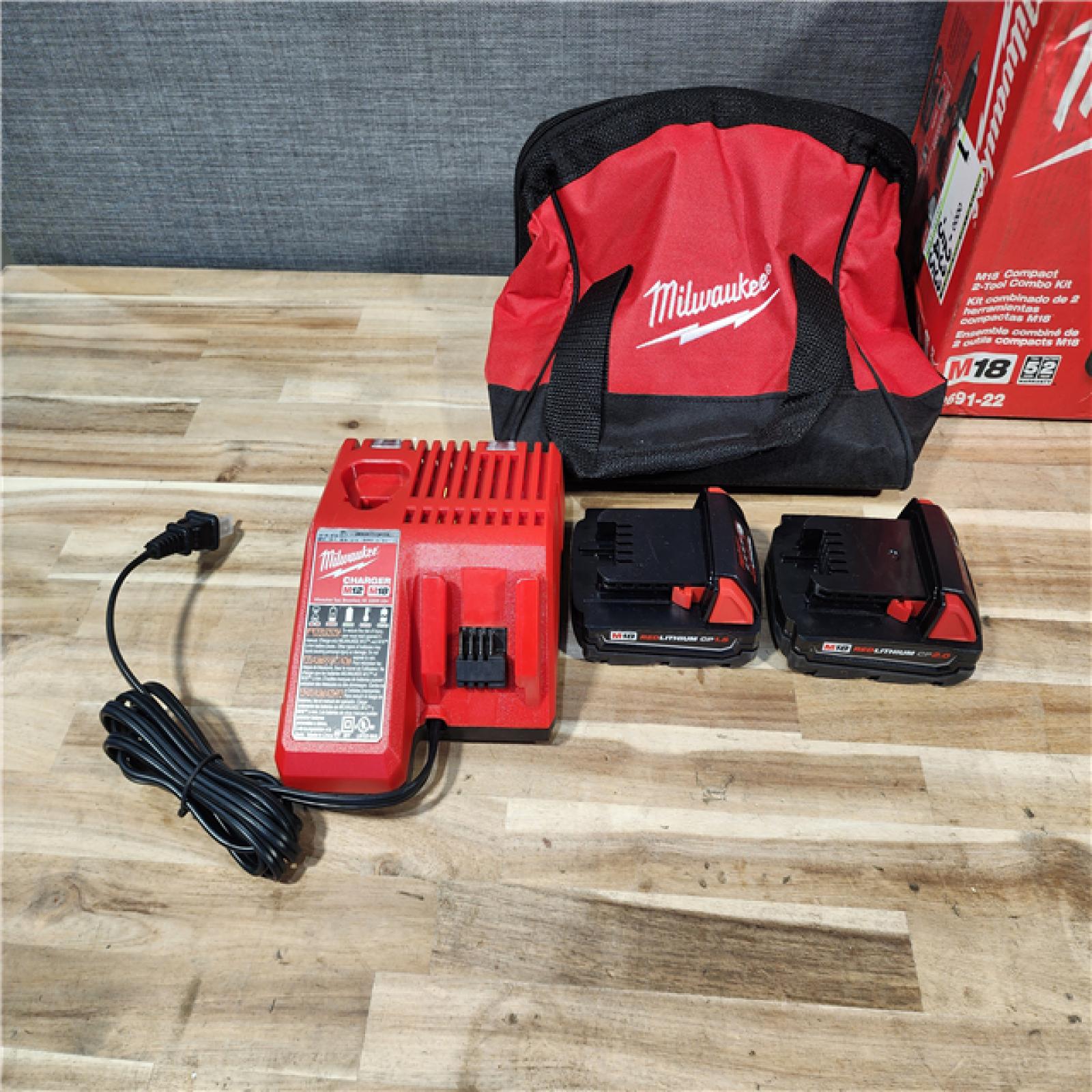 HOUSTON LOCATION - AS-IS Milwaukee 18V Lithium-Ion Cordless Drill Driver/Impact Driver Combo Kit